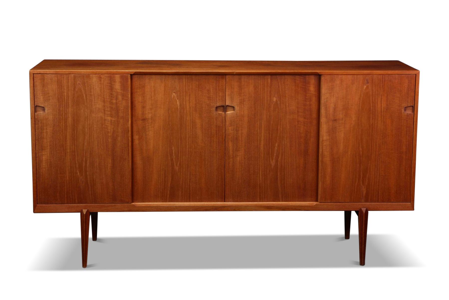 Origin: Denmark
Designer: Henry Rosengren Hansen
Manufacturer: Brande Møbelfabrik
Era: 1950s
Materials: Teak
Measurements: 79? wide x 18.5? deep x 41.25? tall

Condition:
In excellent original condition.