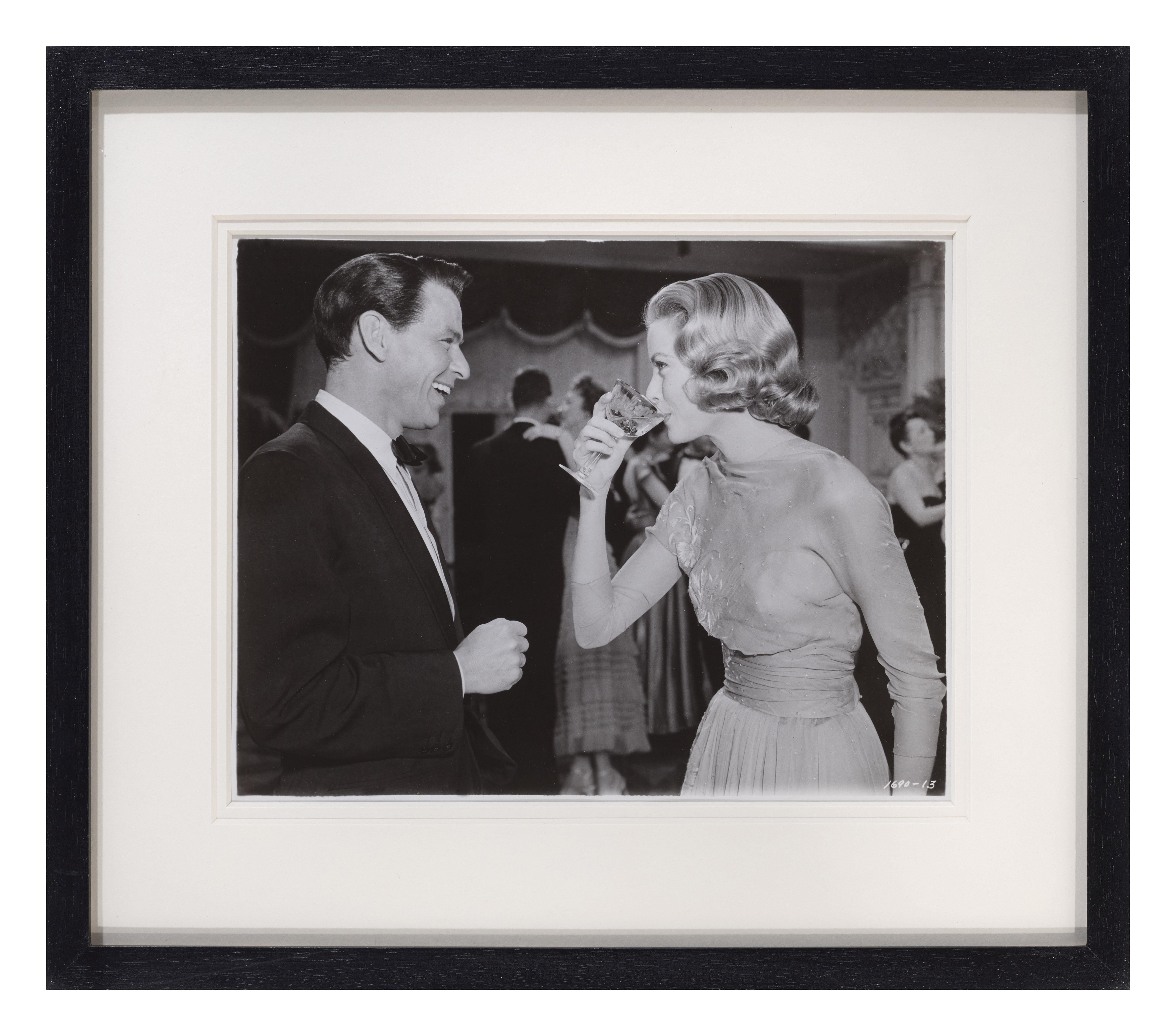 Original US studio production photo for the 1956 Classic comedy, musical starring Bing Crosby, Grace Kelly, Frank Sinatra, Louis Armstrong The film was remake of the 1940 The Philadelphia Story.
This piece is conservation framed with UV Plexiglas