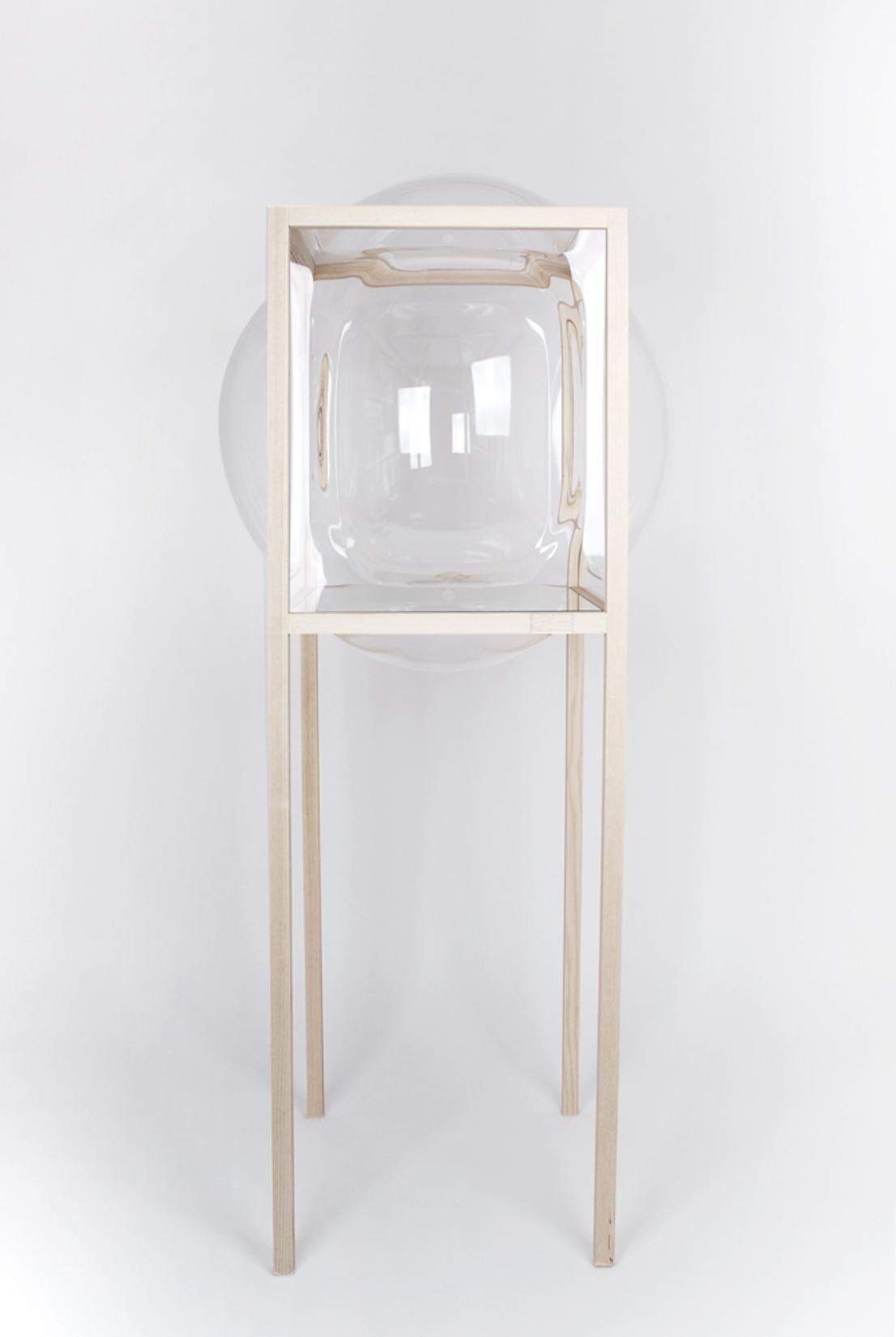 High Standing Curator Bubble Cabinet by Studio Thier & van Daalen
Dimensions: W 65 x D 65 x H 138 cm
Materials: Ash, Acrylic Glass, Glass
Also Available: Extra options available,

These bubbles in a wooden frame brighten up your day! As if your