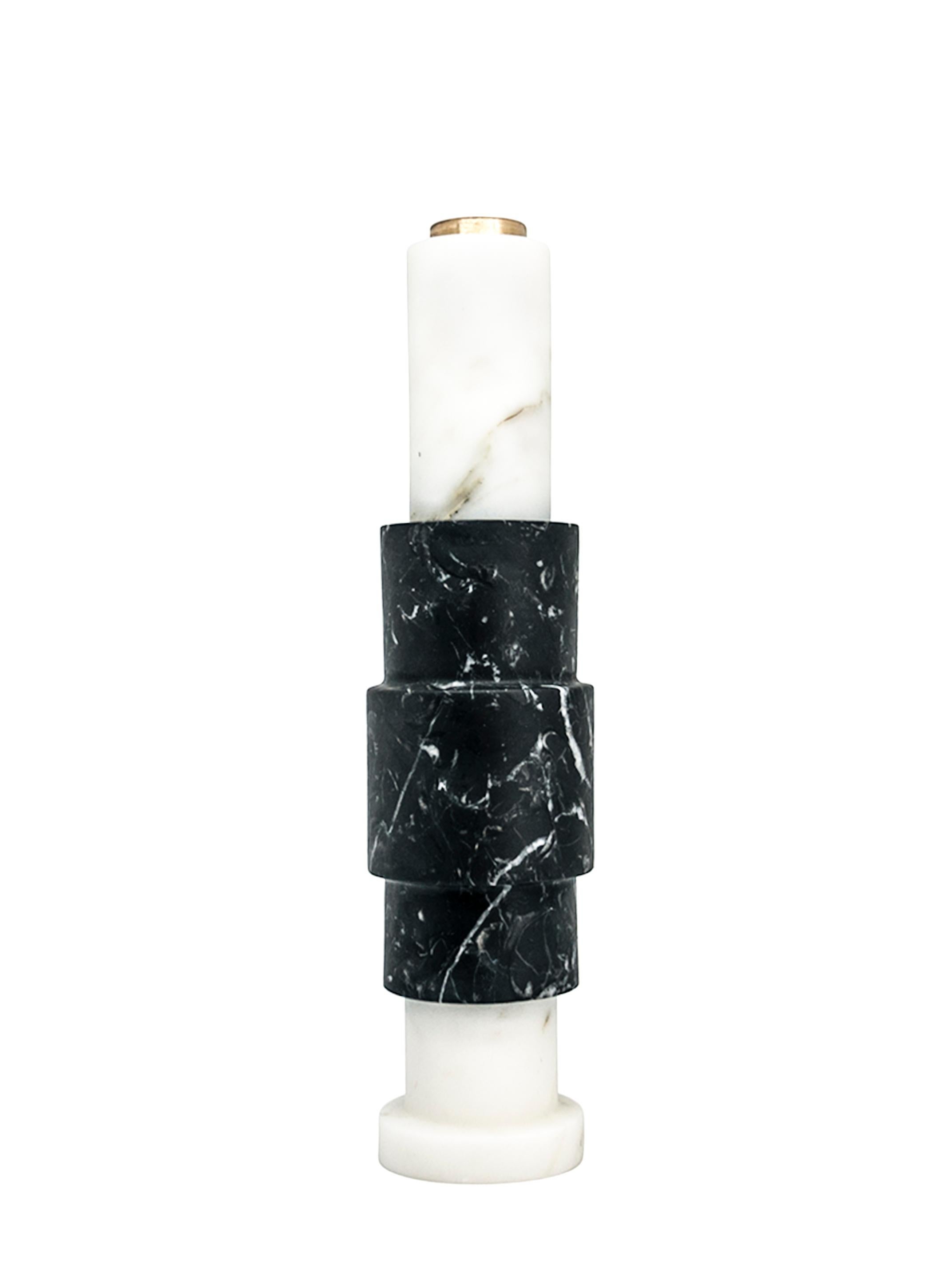 High squared two-tone candleholder in white Carrara marble, black Marquina marble and brass. 
-Jacopo Simonetti Design for FiammettaV-
Each piece is in a way unique (every marble block is different in veins and shades) and handmade by Italian
