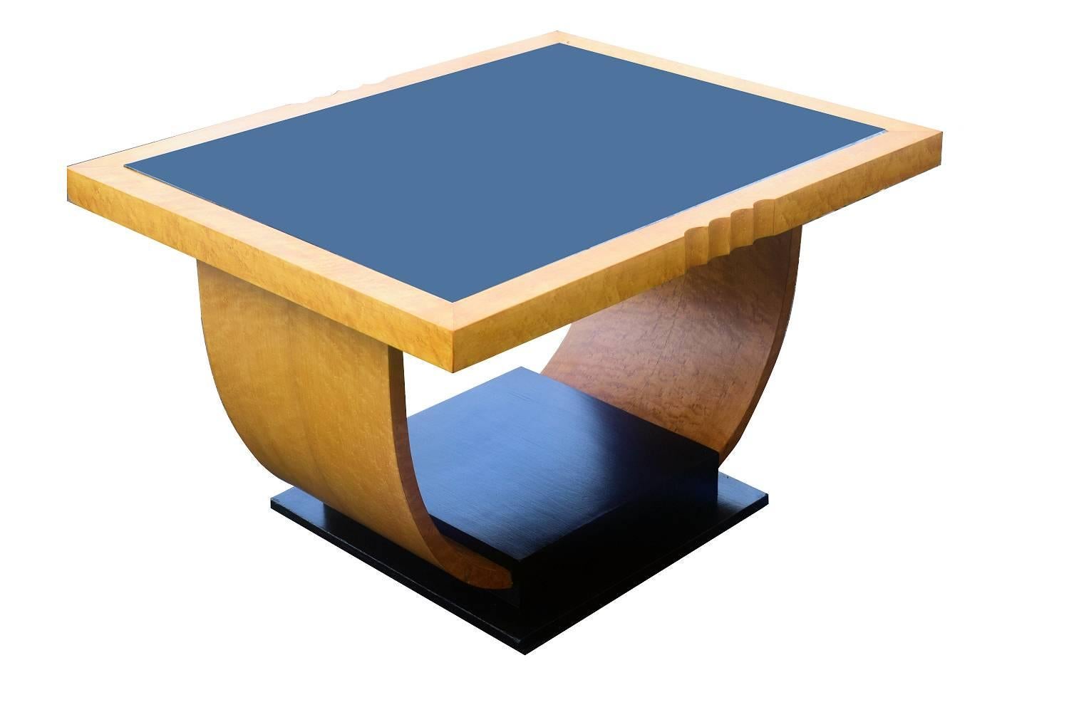 For your consideration is this fabulously stylish Art Deco English occasional table. Light blonde maple veneer is accentuated beautifully with the ebonised woods. Black glass top, so easily maintained and cleaned. Generously proportioned so could