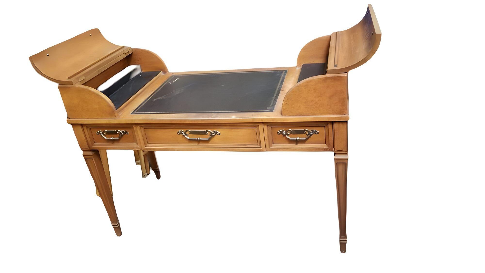 Custom made high style bird's-eye maple George Washington double end desk by Drexel. The desktop features a leather topped writing surface embossed with gold leaf. There are three pull-out drawers along the front and unique build in lift storage