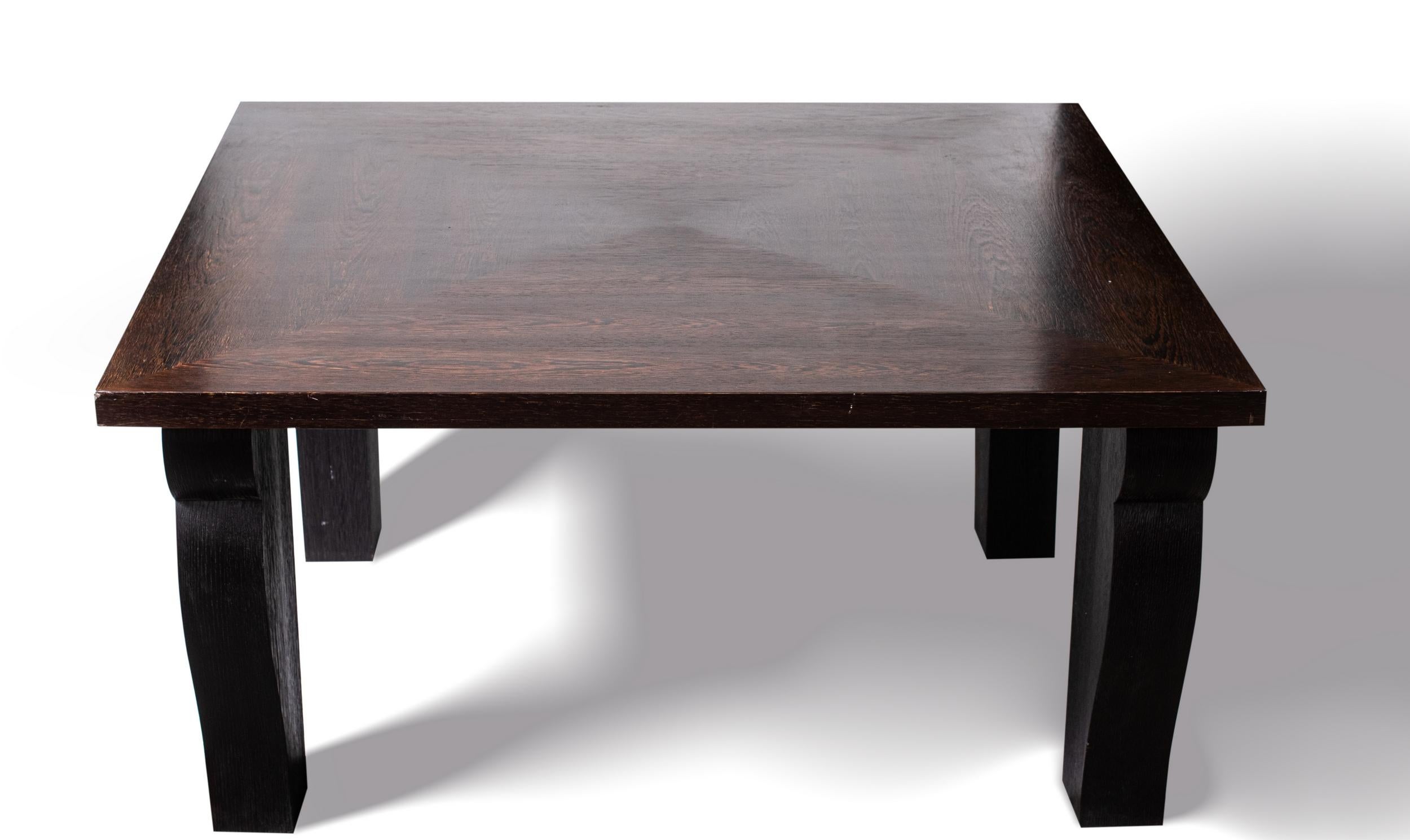 Dining room table designed by Jean-Michel Frank and Adolphe Chanaux in 1935. Stained oak and “sun” wenge veneer. Reedited by Ecart International.

Width: 150 cm (59 inches)
Depth: 150 cm (59 inches)
Tray thickness: 5 cm (2 inches)
Height: 74 cm