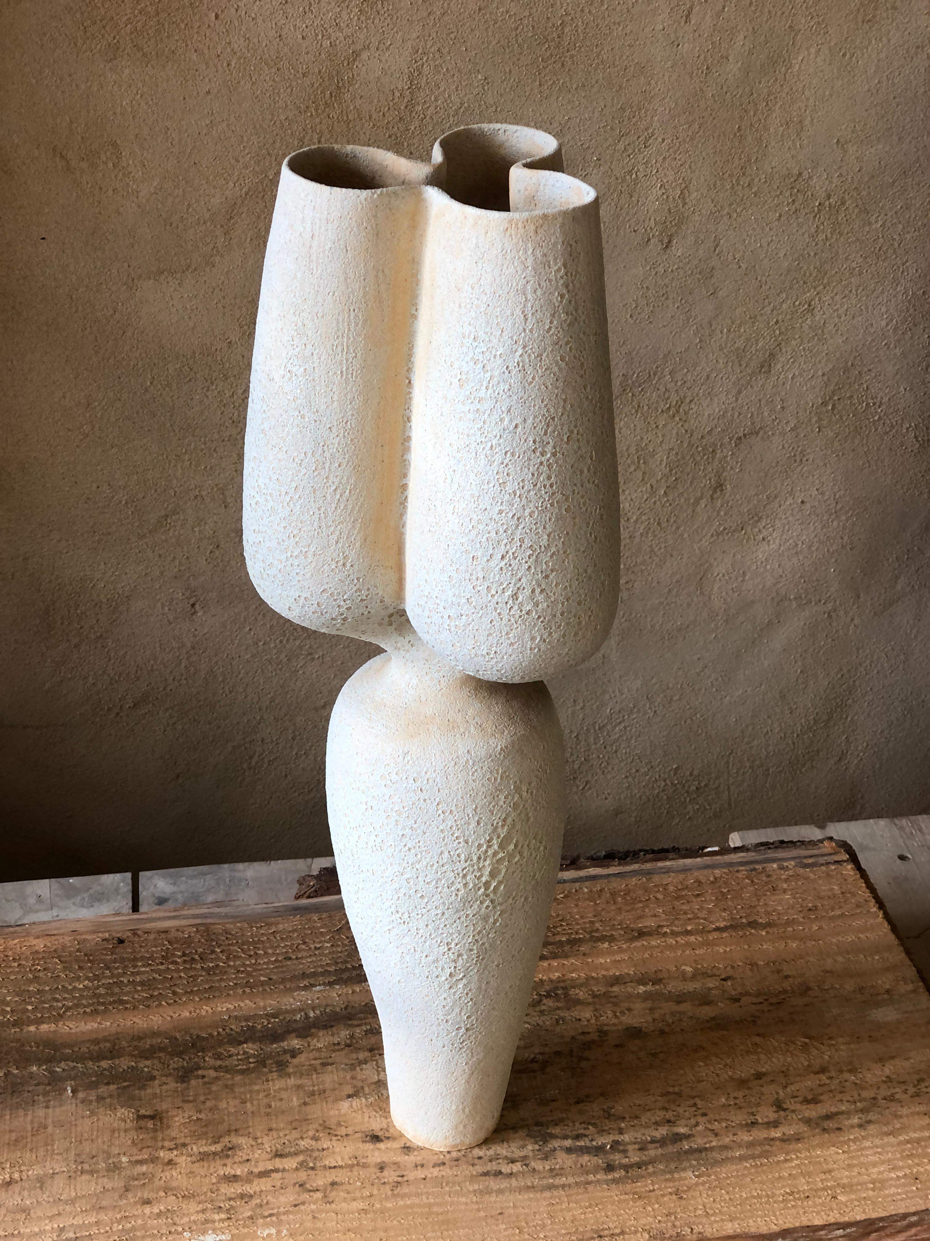 High Triple Vase by Sophie Vaidie
One Of A Kind.
Dimensions: Ø 13 x H 55,5 cm. 
Materials: Beige stoneware with crater glaze.

In the beginning, there was a need to make, with the hands, the touch, the senses. Then came the desire to create and