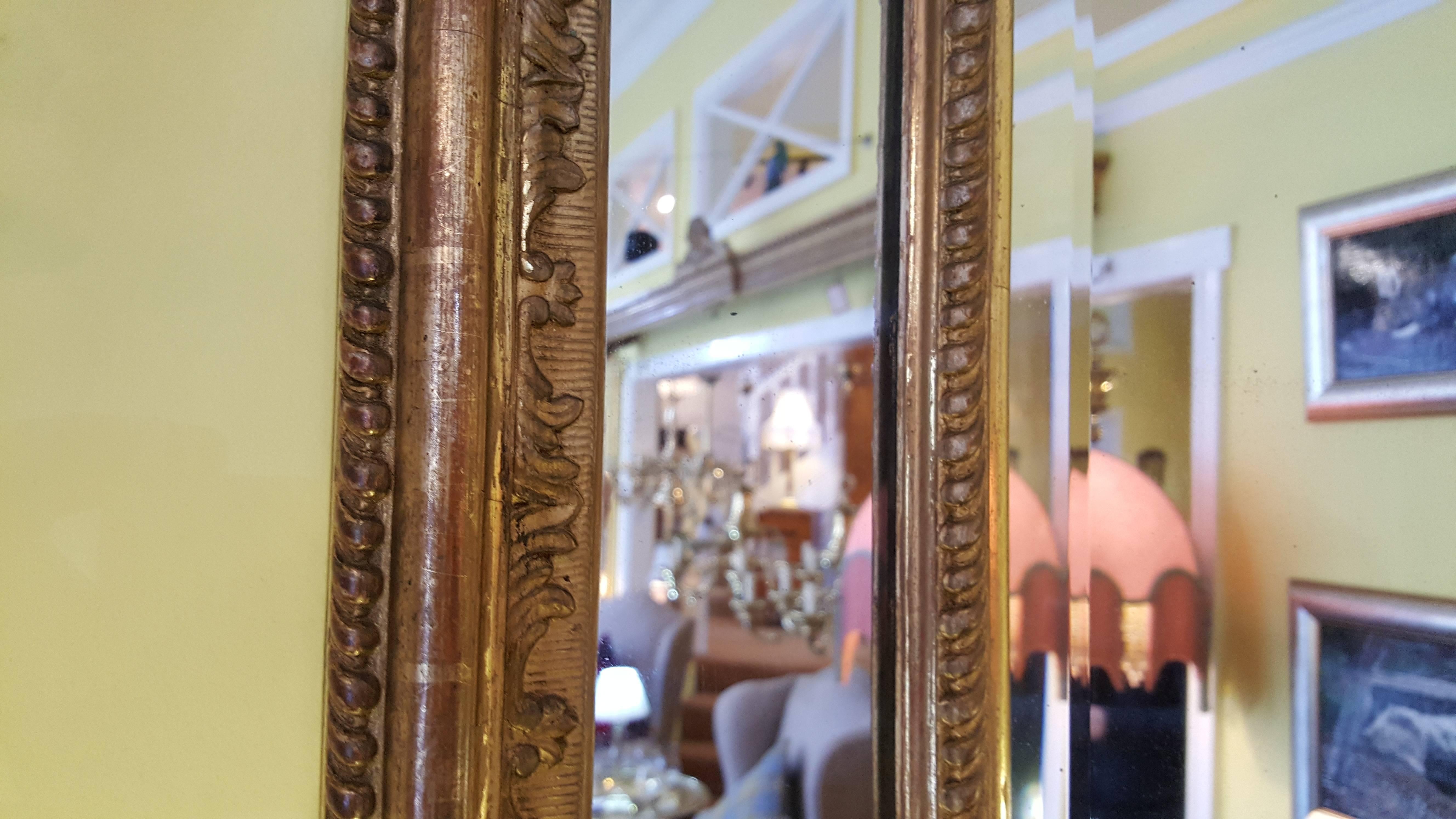 Late 19th Century High Victorian Giltwood and Gesso Framed Mirror