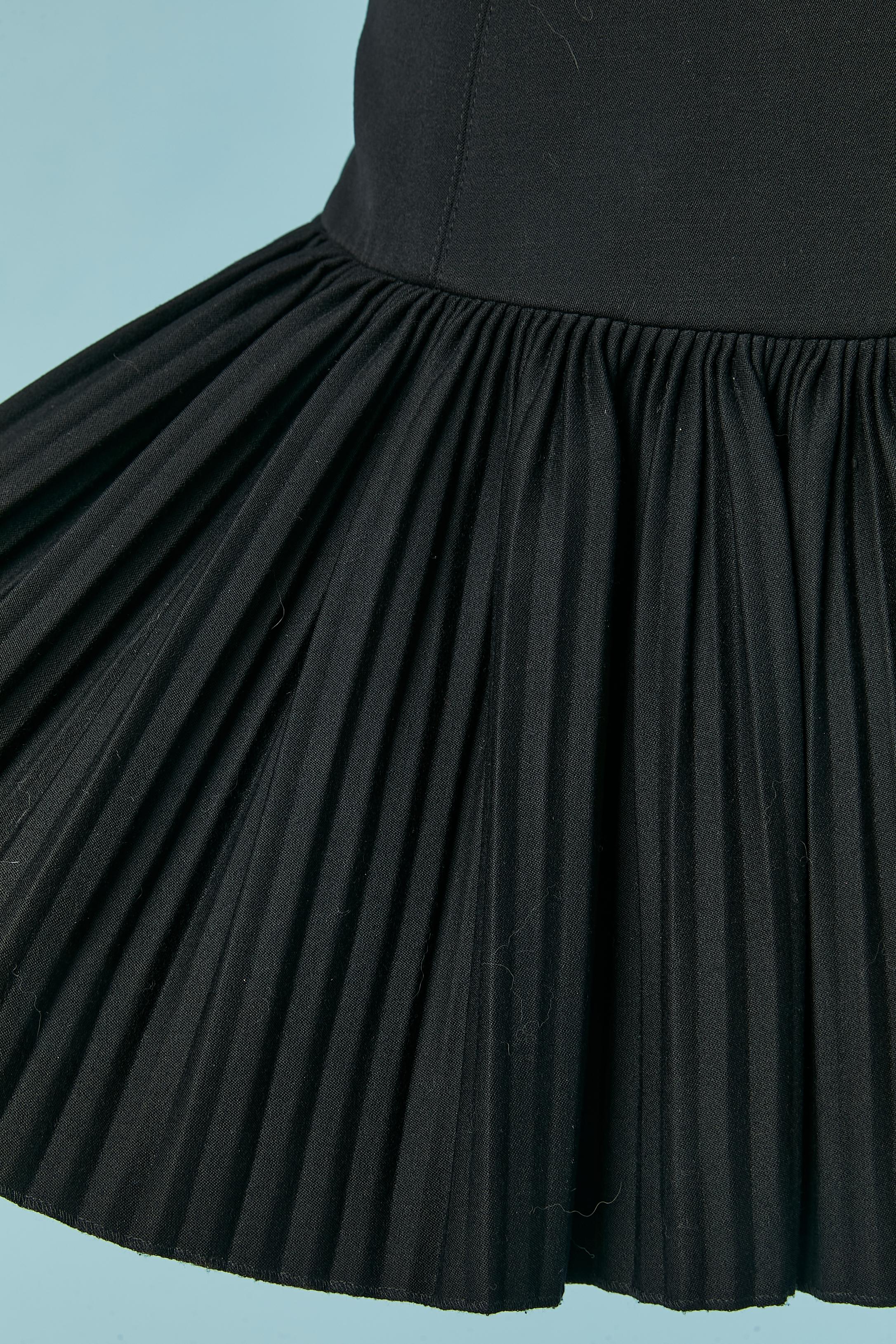 Black skirt with laces on the middle back . Boned around the waist. Gather on the half back of the skirt. 
Black rayon lining. 
SIZE 38 (Fr) M 
