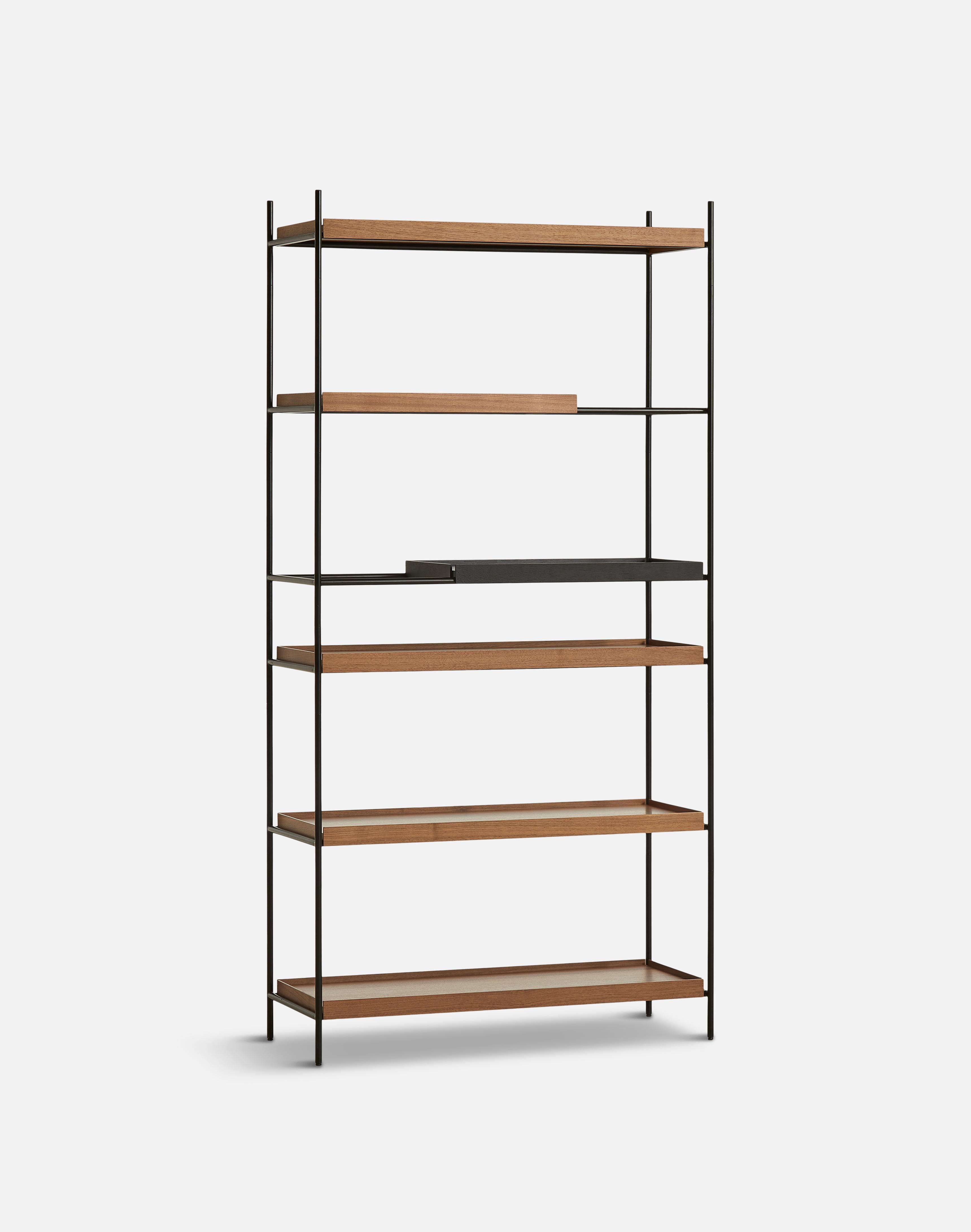 High walnut and black tray shelf V by Hanne Willmann
Materials: metal, walnut.
Dimensions: D 40 x W 100 x H 201 cm
Also available in different tray conbinations and 2 sizes: H81, H 201 cm.

Hanne Willmann is a dynamic German designer with her