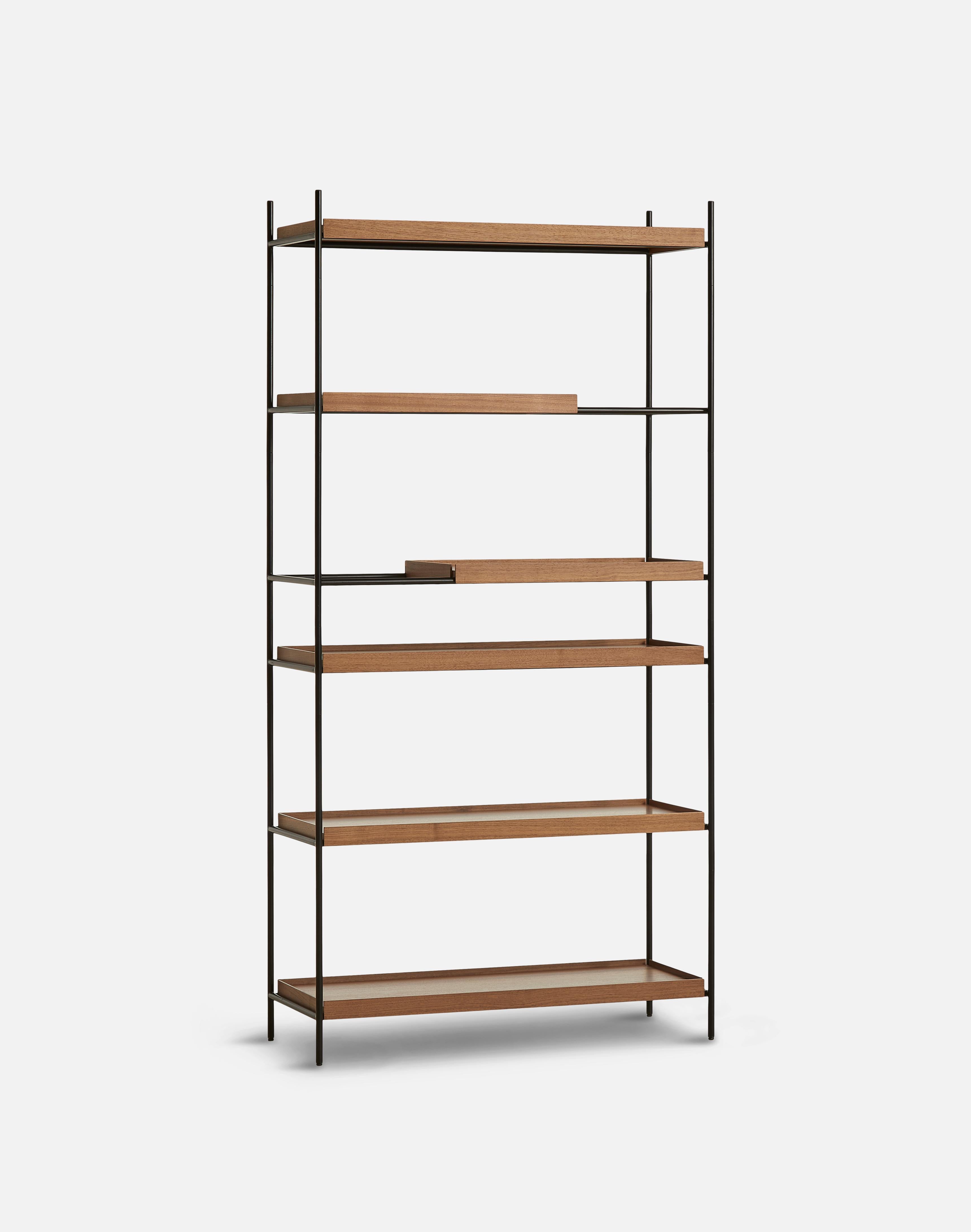 High walnut tray shelf by Hanne Willmann
Materials: Metal, walnut.
Dimensions: D 40 x W 100 x H 201 cm
Also available in different tray conbinations and 2 sizes: H81, H 201 cm.

Hanne Willmann is a dynamic German designer with her own