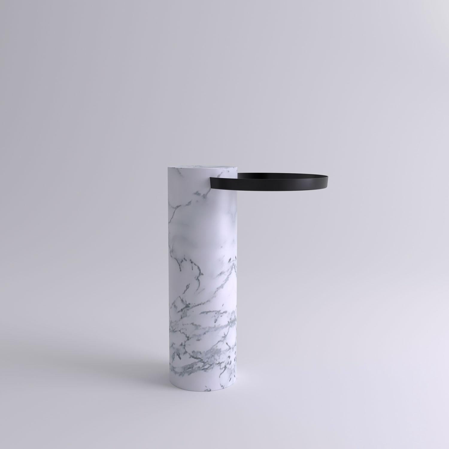 High white marble contemporary guéridon, Sebastian Herkner
Dimensions: D 42 x H 57 cm
Materials: Pele de Tigre marble, black metal tray

The salute table exists in 3 sizes, 4 different marble stones for the column and 5 different finishes for