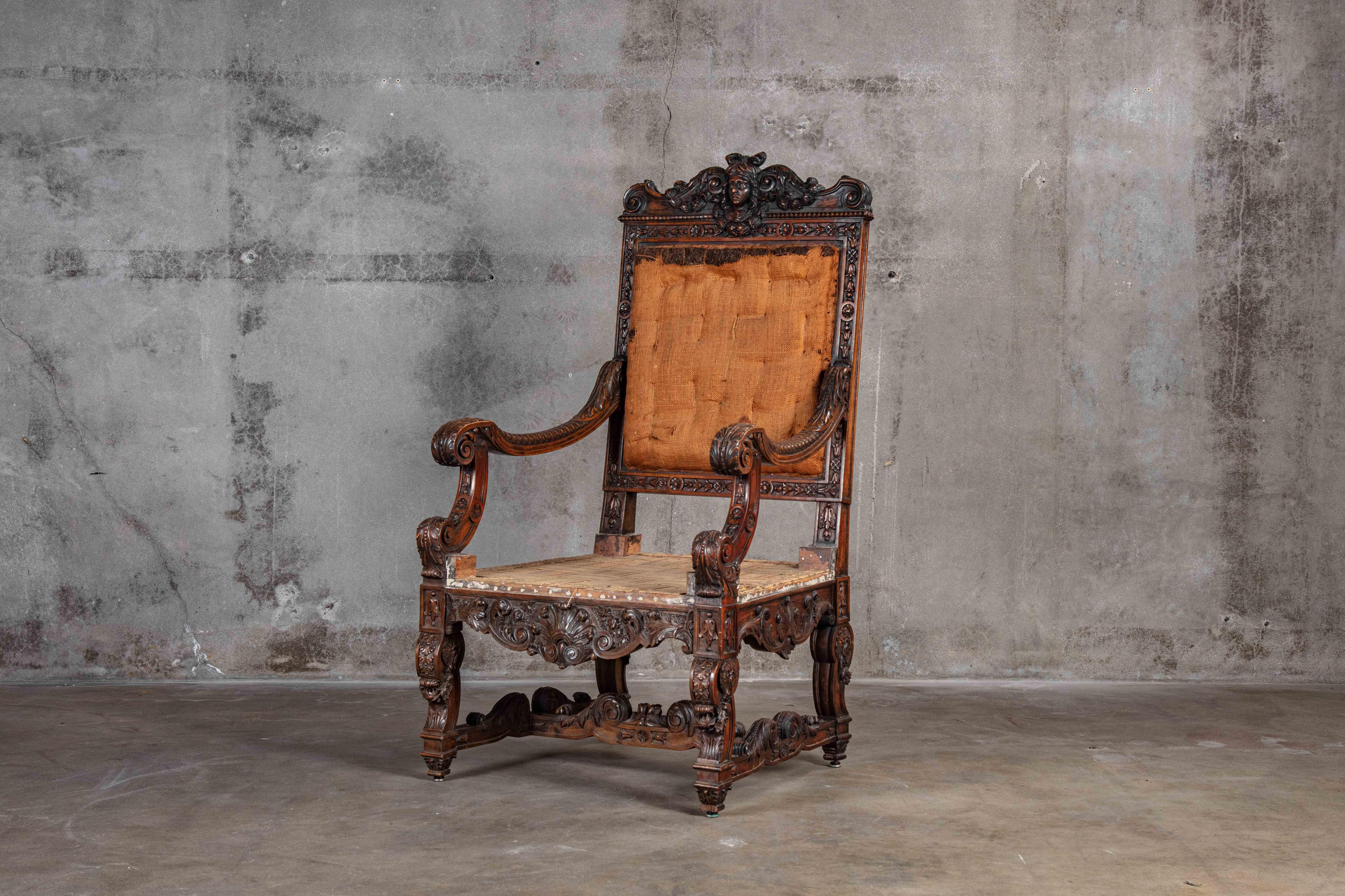 Carved high back armchair with caryatid head and scrolled arms, 19th century

Measure: Seat 17