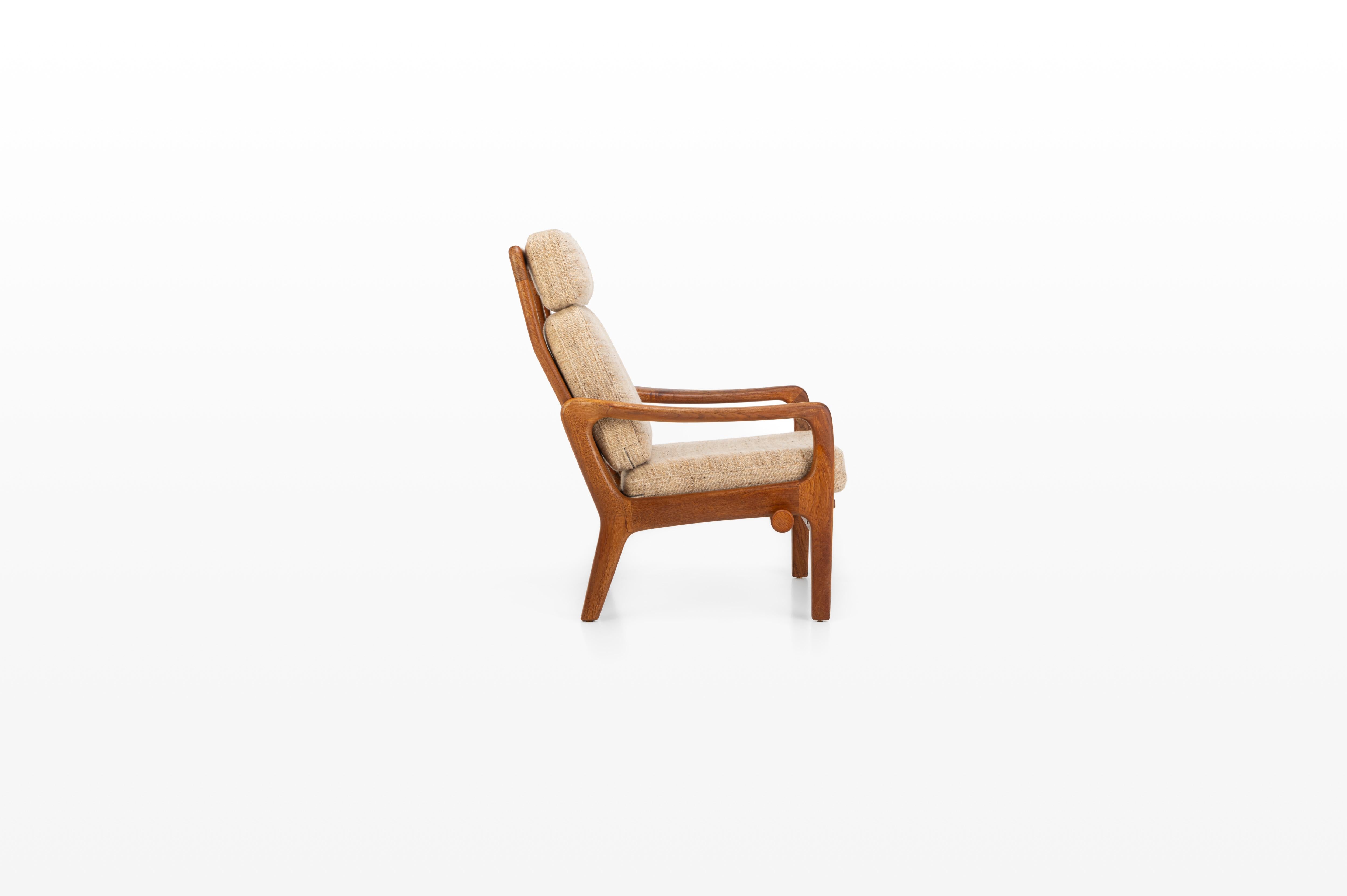 Lounge chair designed by Juul Kristensen for JK Denmark 1960s. The frame of the armchair is in solid teak. The cushions are in beige wool. The lounge chair can be placed in different positions using the lever on the side. Marked by the