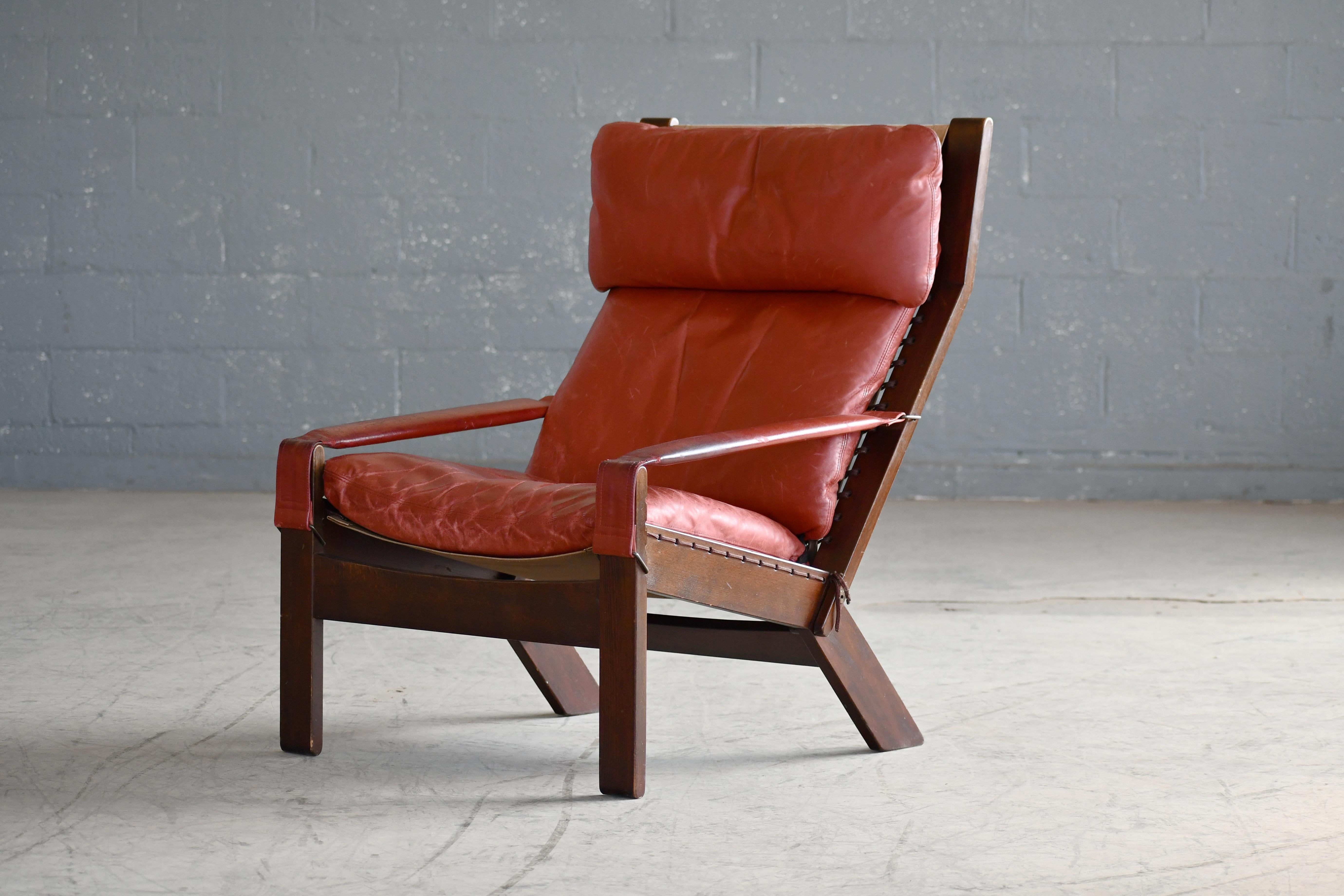 Scandinavian Modern Highback Safari Style Lounge Chair by Torbjorn Afdal in Brick Red Leather