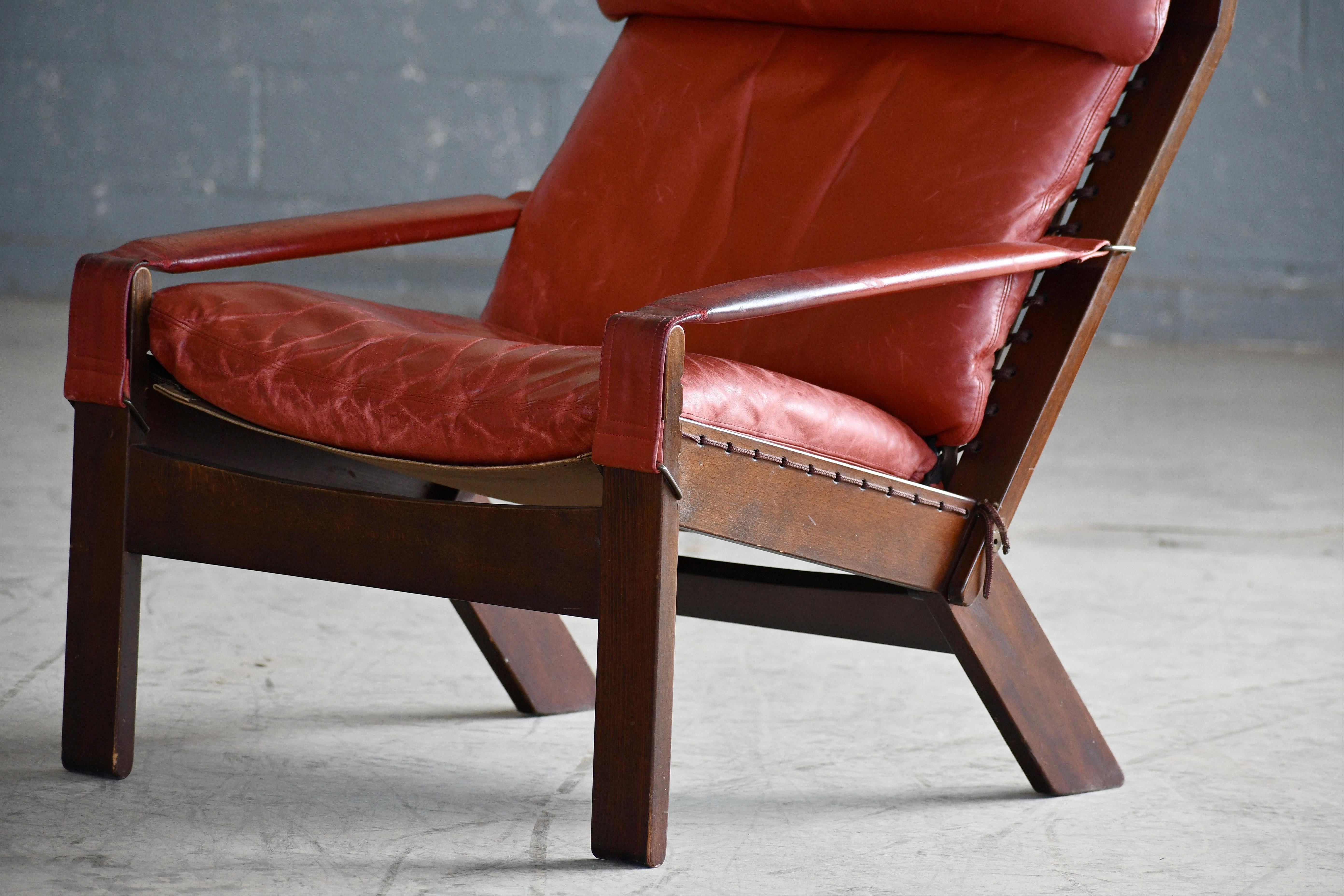 Norwegian Highback Safari Style Lounge Chair by Torbjorn Afdal in Brick Red Leather