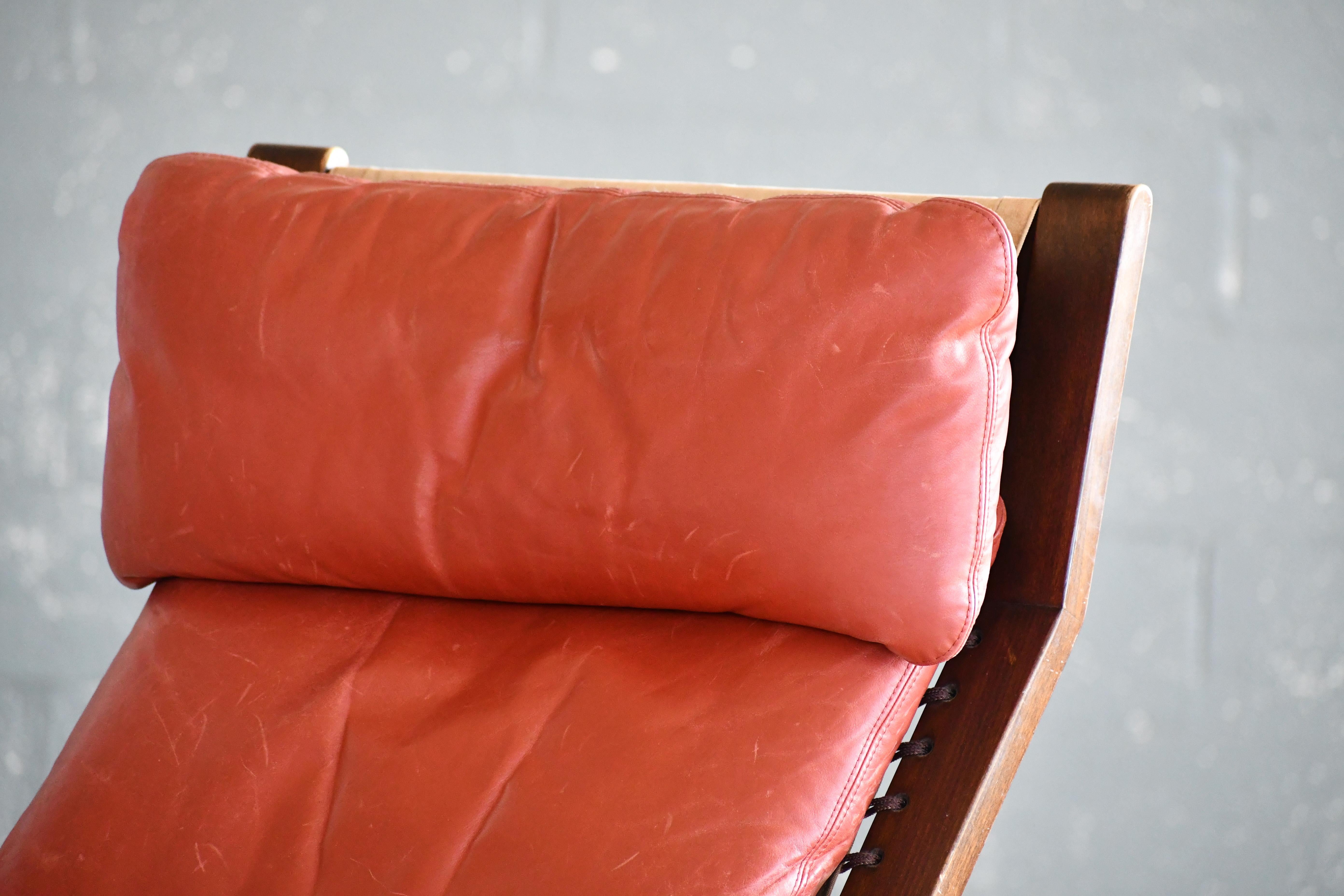 Highback Safari Style Lounge Chair by Torbjorn Afdal in Brick Red Leather In Good Condition In Bridgeport, CT