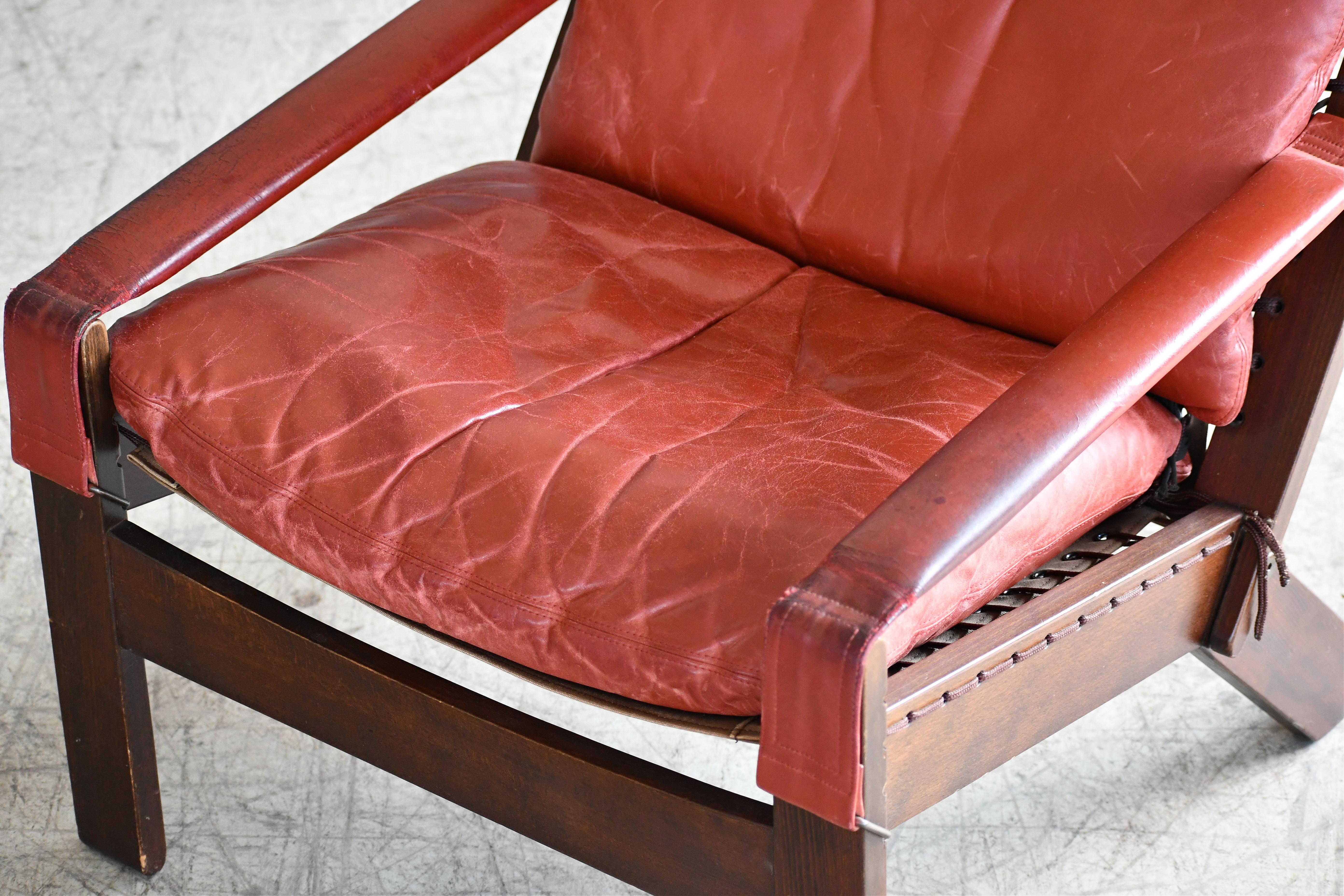 Mid-20th Century Highback Safari Style Lounge Chair by Torbjorn Afdal in Brick Red Leather