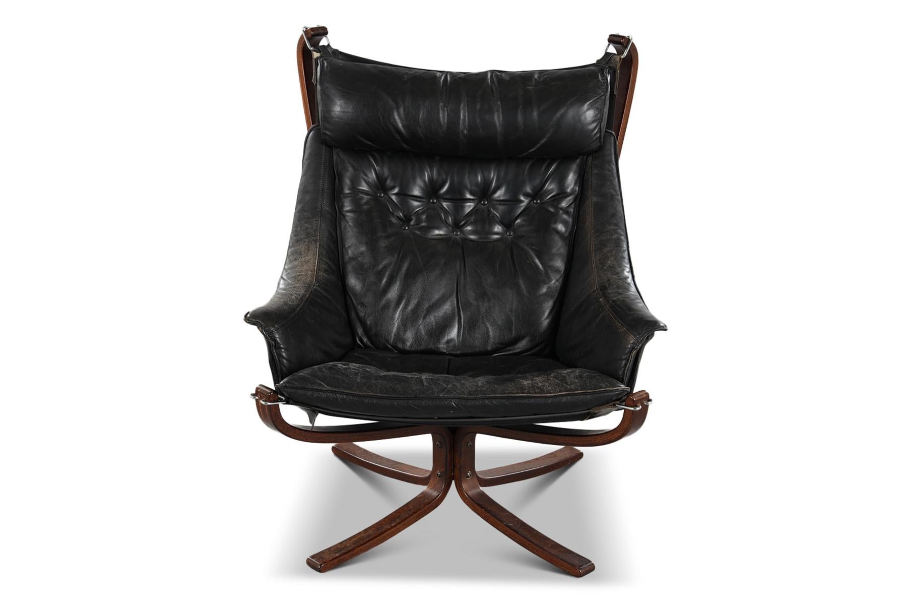 Origin: Norway
Designer: Sigurd Ressell
Manufacturer: Vatne Møbler
Era: 1960s
Materials: Leather, Bent Beech
Measurements: 33″ wide x 32″ deep x 39.5″ tall
Seat Height: 18″ tall

Condition: In excellent original condition.