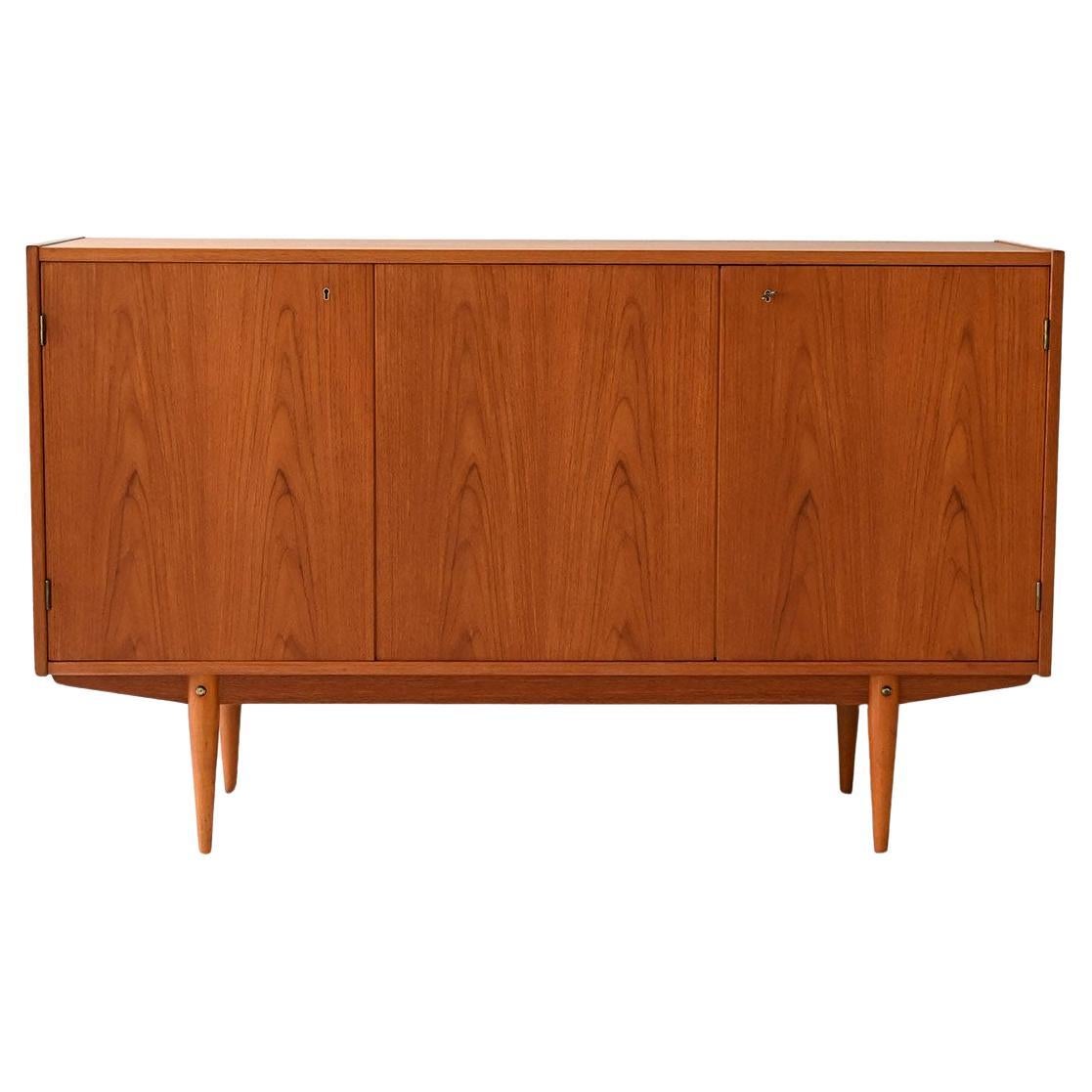 Scandinavian teak highboard with triple compartment For Sale