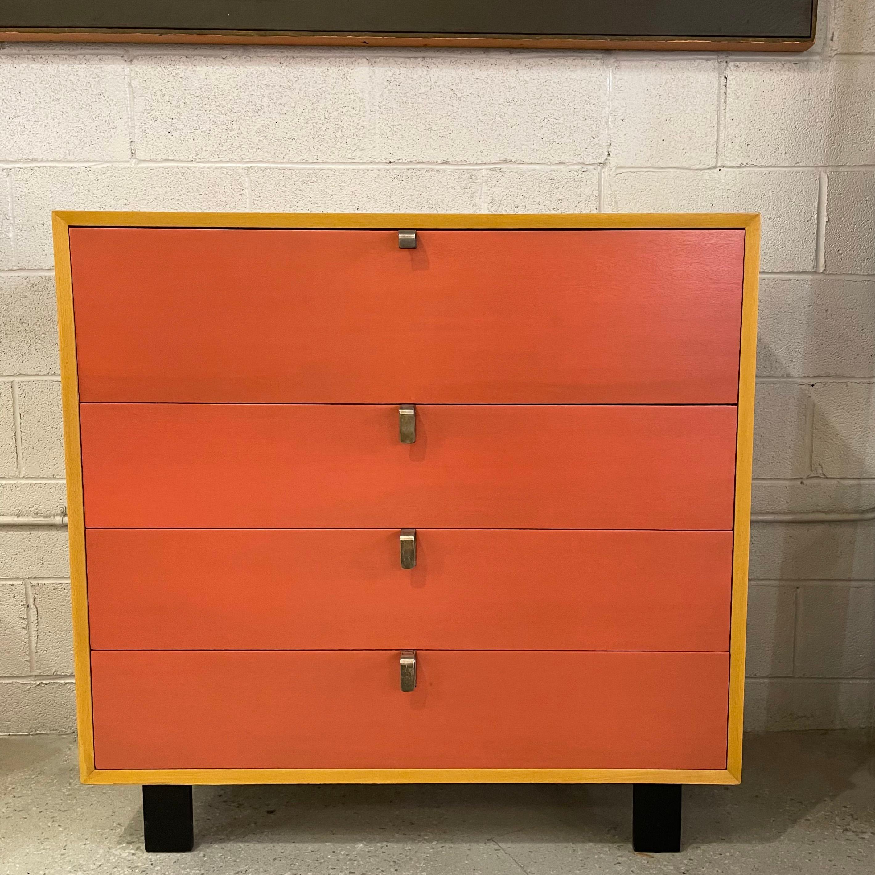 George Nelson for Herman Miller, birch plywood, highboy dresser, secretary, features a newly finished coral lacquered front with natural trim and black lacquered legs and aluminum pulls. There are 3 bottom drawers and a pull down, top secretary with