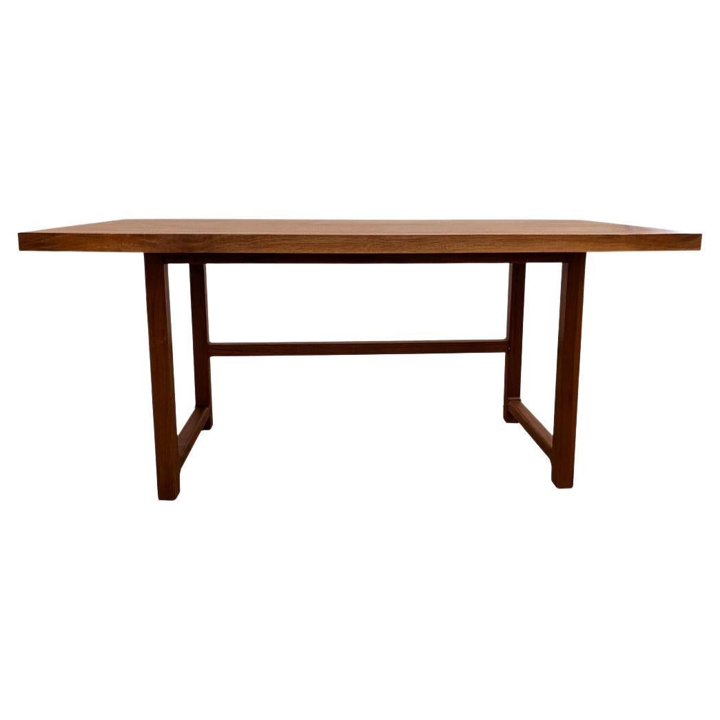 New York Heartwoods' contemporary black walnut Highland Desk features a solid wood top hand selected for its unique beauty and character, faceted corners, butterfly key inlays, and a Mid-Century design inspired base.

Using sustainable wood milled