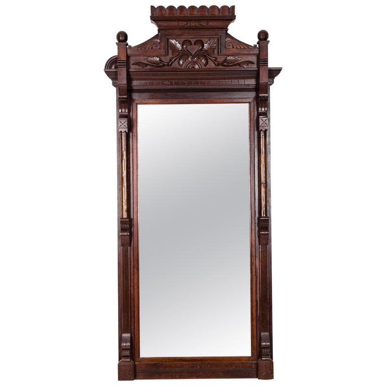 Highly Carved Mahogany Wood Framed Hanging Wall Mirror For Sale at