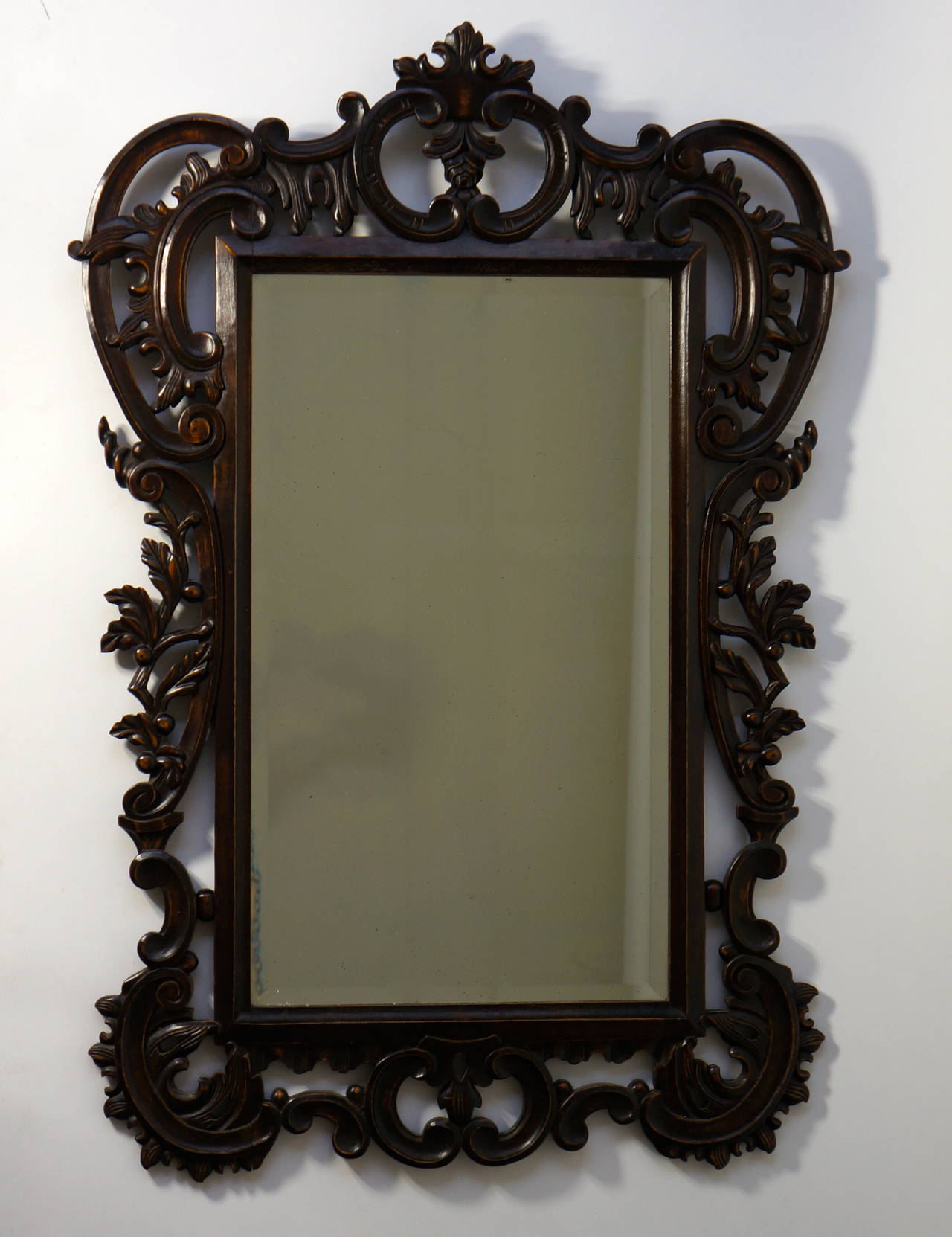 A large, highly carved vintage mirror in the Baroque style with beautiful patine. This item is great for formal and informal setting.
Beach house or city loft, this mirror covers it all.
Measures: Height 103 cm.
Width 72 cm.