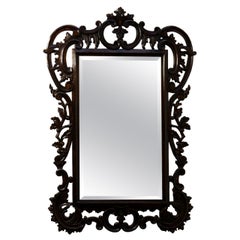 Miroir vintage en bois hautement sculpté