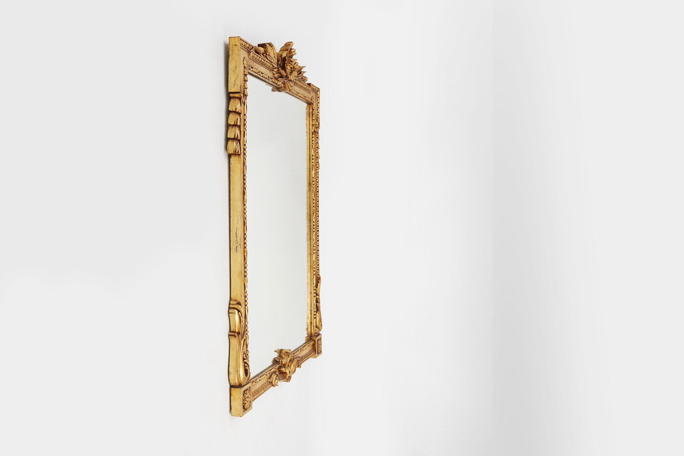 Highly decorated gilted carved wooden wall mirror, Belgium ca. 1950 In Good Condition For Sale In Meulebeke, BE