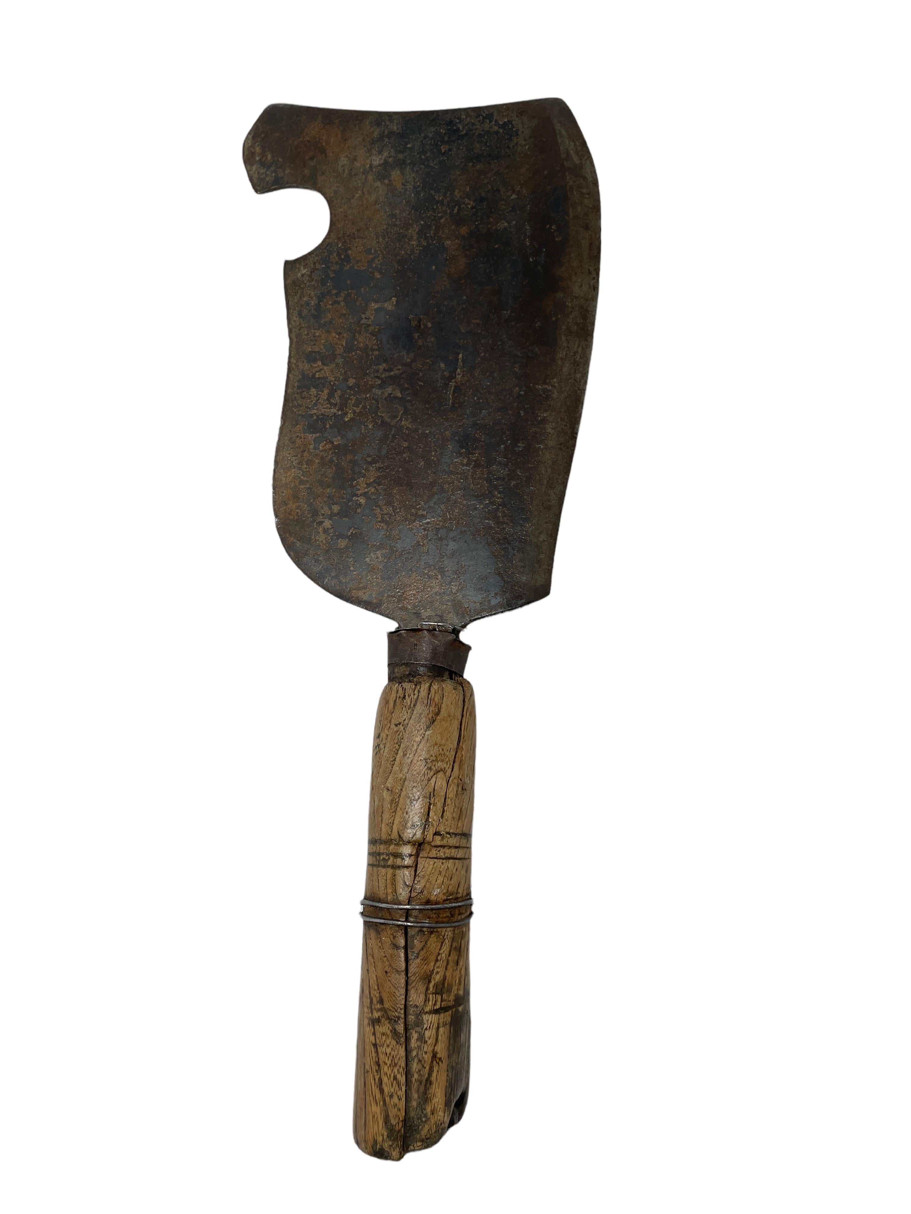 Antique 19th century European cleaver. Made from hand-wrought iron with wood handle. Great as a graphic wall decoration. Found at an estate sale in Bolzano; Italy. Nice to display with your Butcher Block.