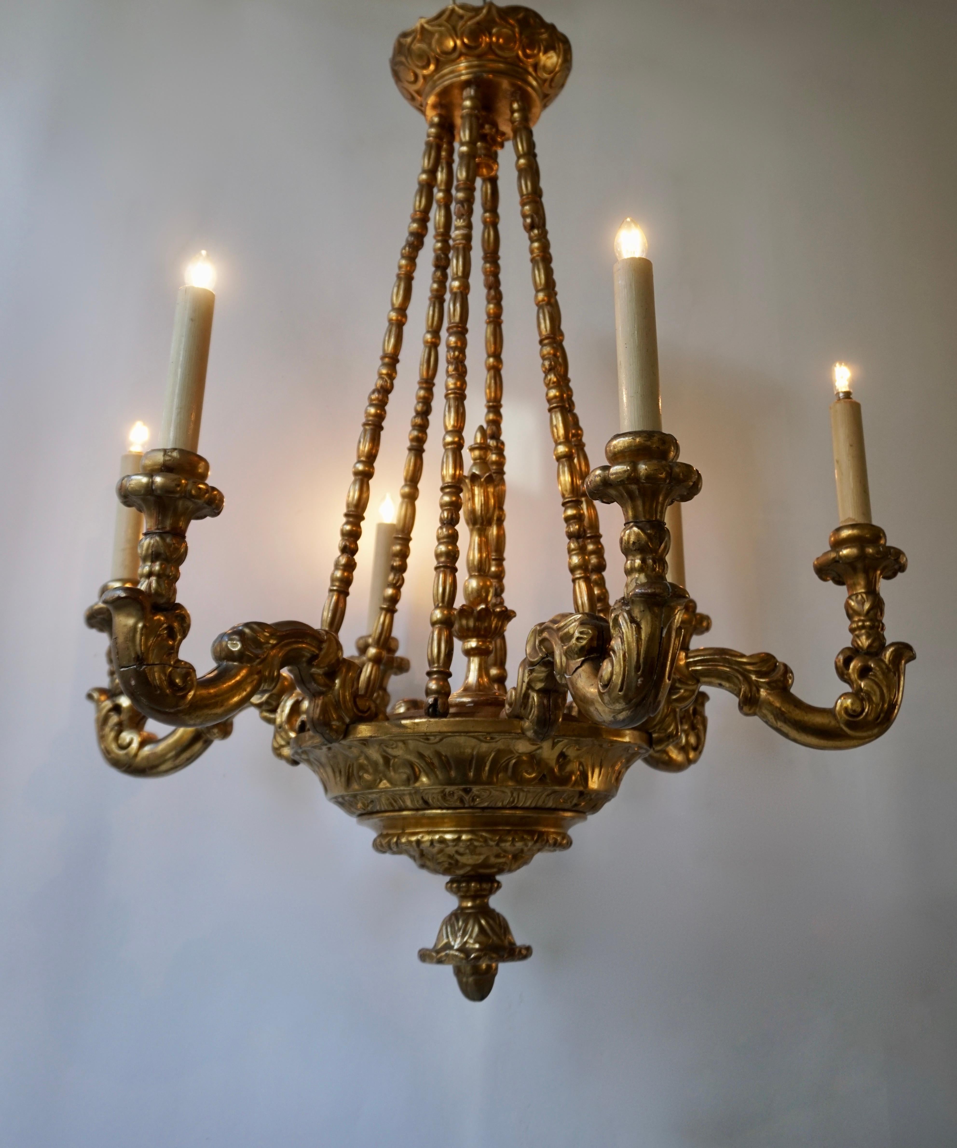Gilt Highly Decorative and Elegant Gilded-Light Chandelier For Sale