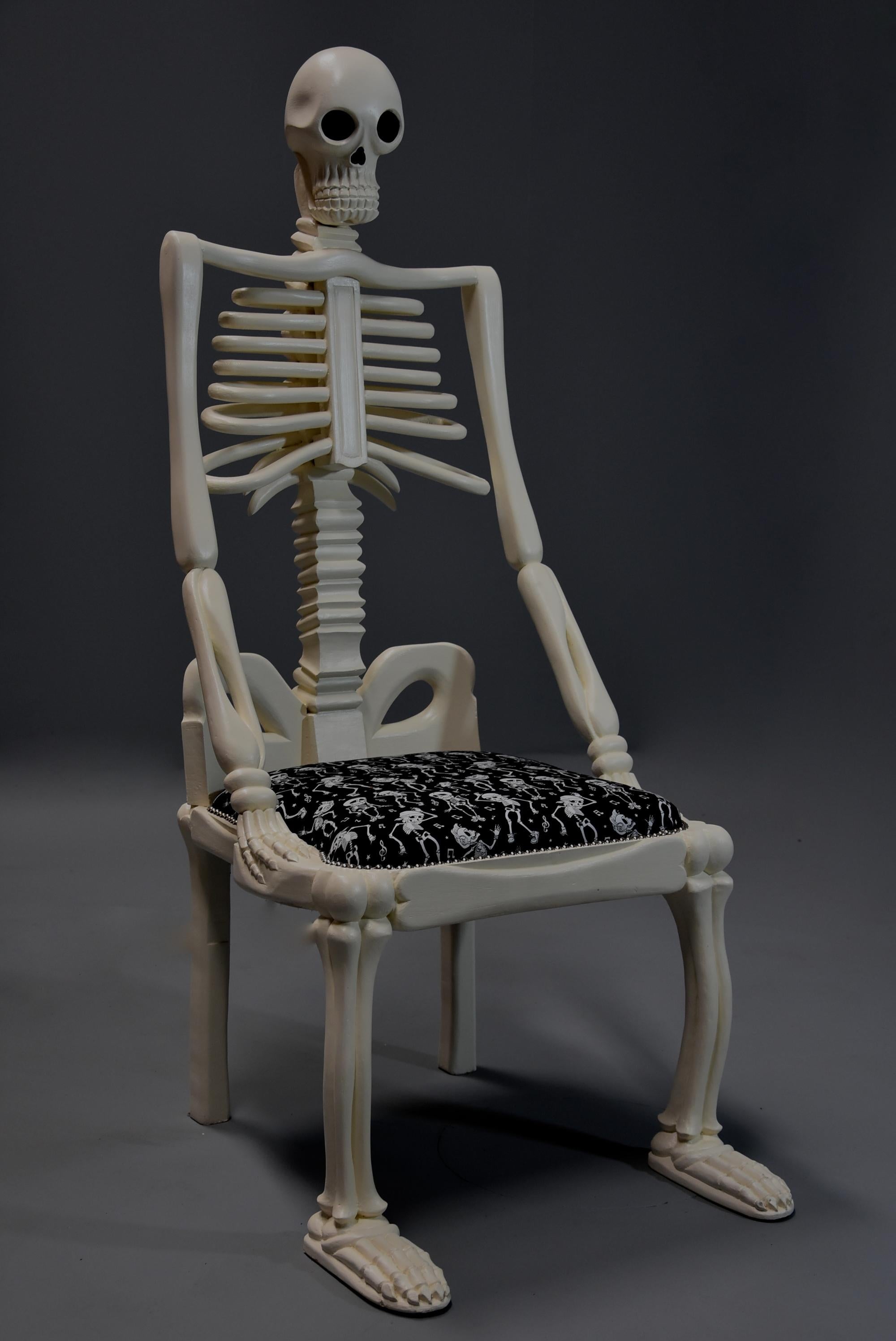 skeleton in a chair