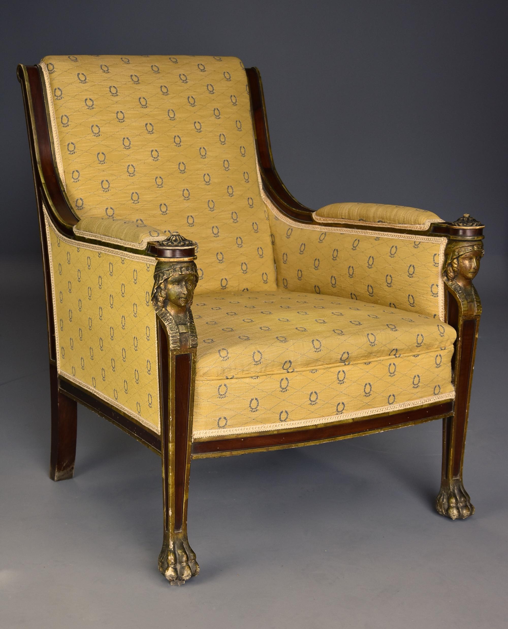 A highly decorative early 20th century French Empire style mahogany armchair with typical Egyptian influence.

This armchair consists of a mahogany frame, this being in original condition, having a 'bronze' paint effect, the mahogany uprights with