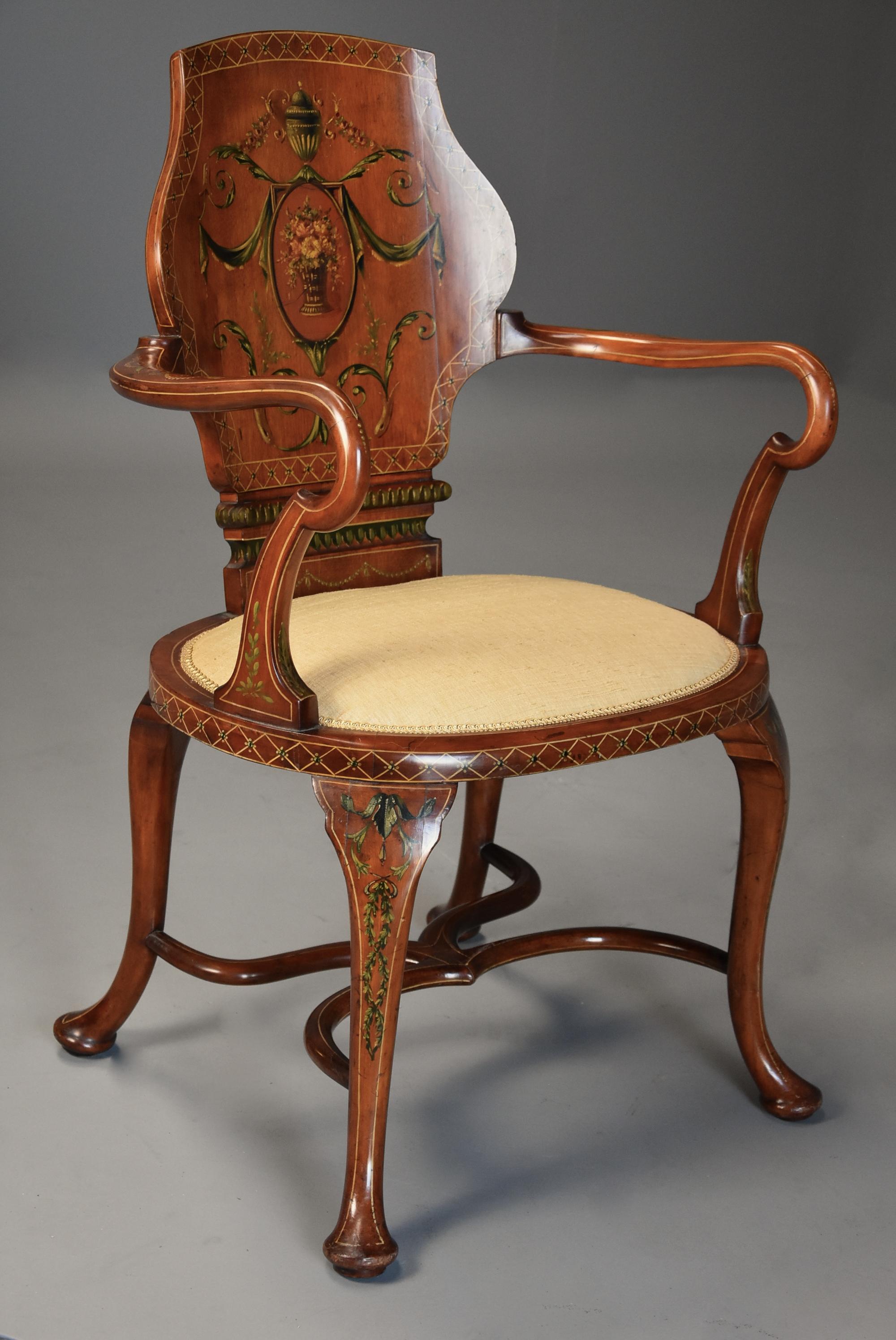 A highly decorative Edwardian satinwood and painted armchair in the Georgian style. 

This armchair consists of a satinwood concave shaped back in the form of a shield, this being a typical Georgian style, with finely painted Classical decoration