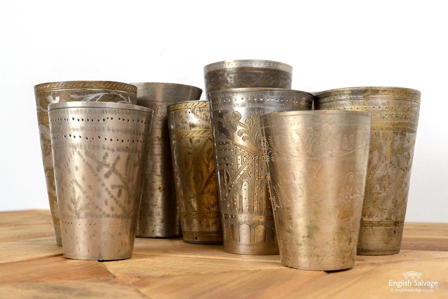 Reclaimed brass lassi cups with intricate decoration, each cup is unique. Lassi is an Indian yoghurt based drink. Details of cups available below (sizes of small and medium cups varies between dimensions stated). Wear to all from past use.