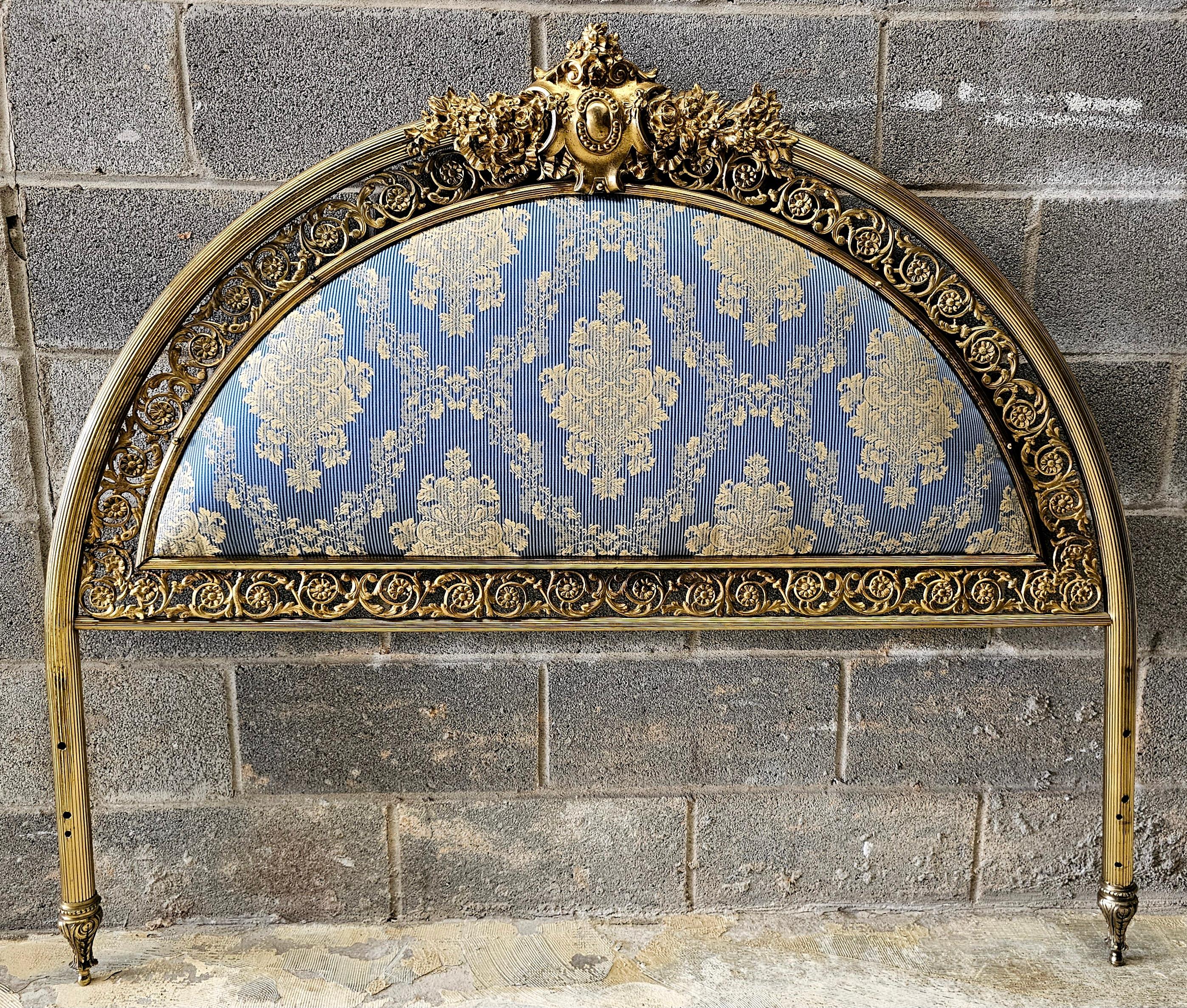 Exceptional High Quality Decorative Brass Louis XVI style Brass and Upholstered Headboard.  Recently re-upholstered and and great condition.
