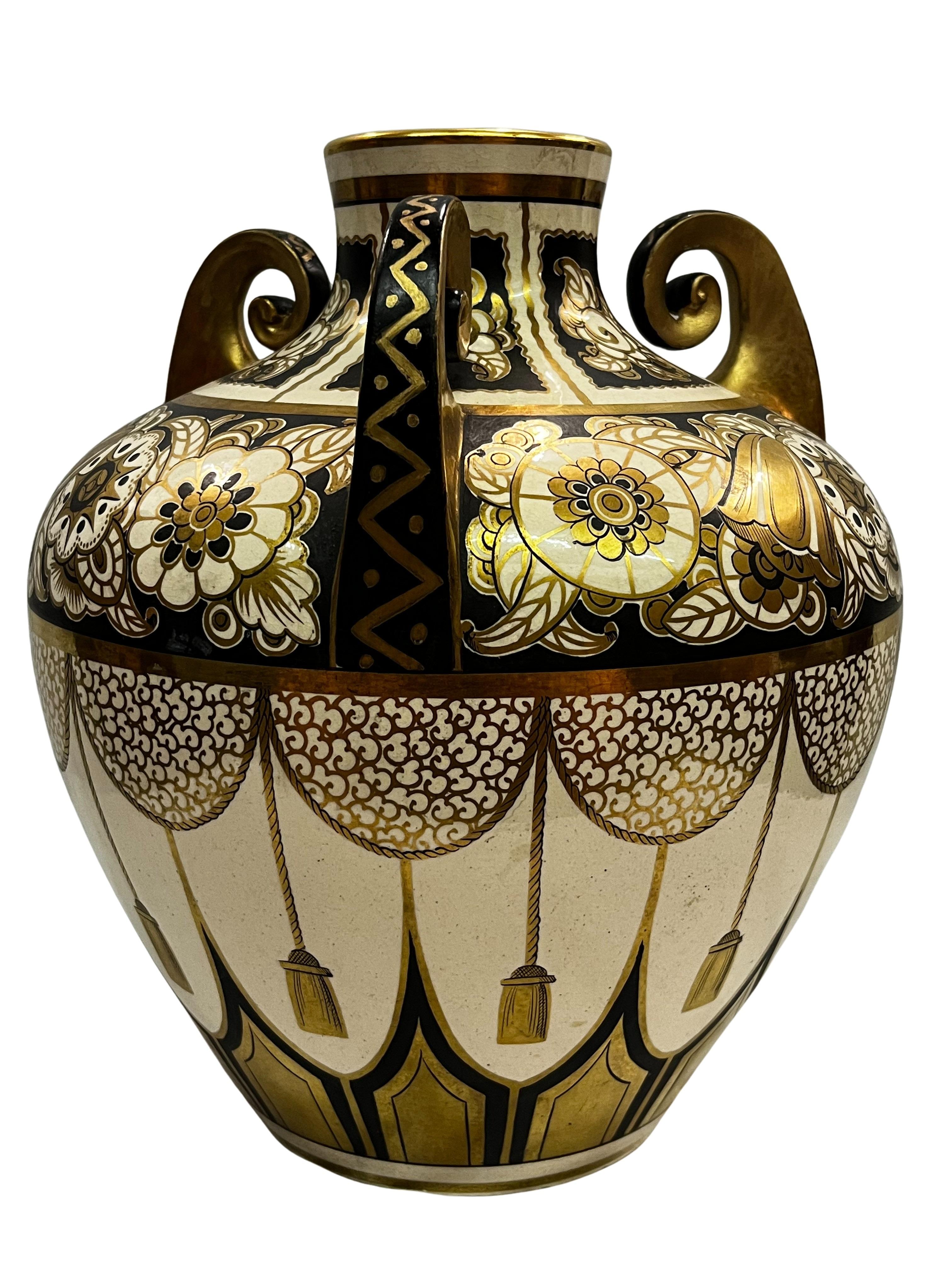 Exceptionally decorative flower vase by the French ceramics manufacturer Pinon-Heuzé, made in the 1920s, listed in the catalog as the Pompon model.

The vase has a particularly spherical shape, with a narrow, round spout at the top surrounded by