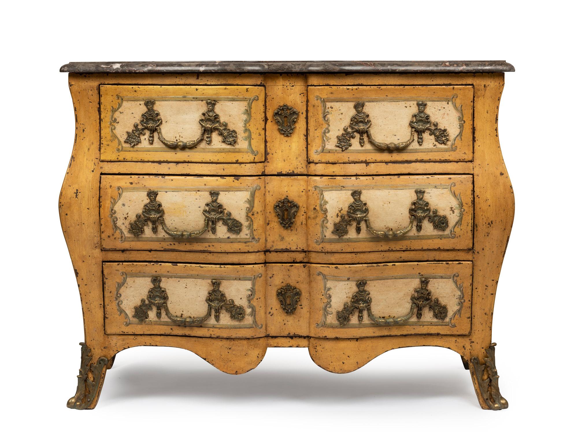 A highly decorative Italian yellow and cream painted chinoiserie bombe three drawer commode
with marble top and decorative gilt metal escutcheons and feet

Measures: 115cm wide, 60cm deep 88cm high.
  