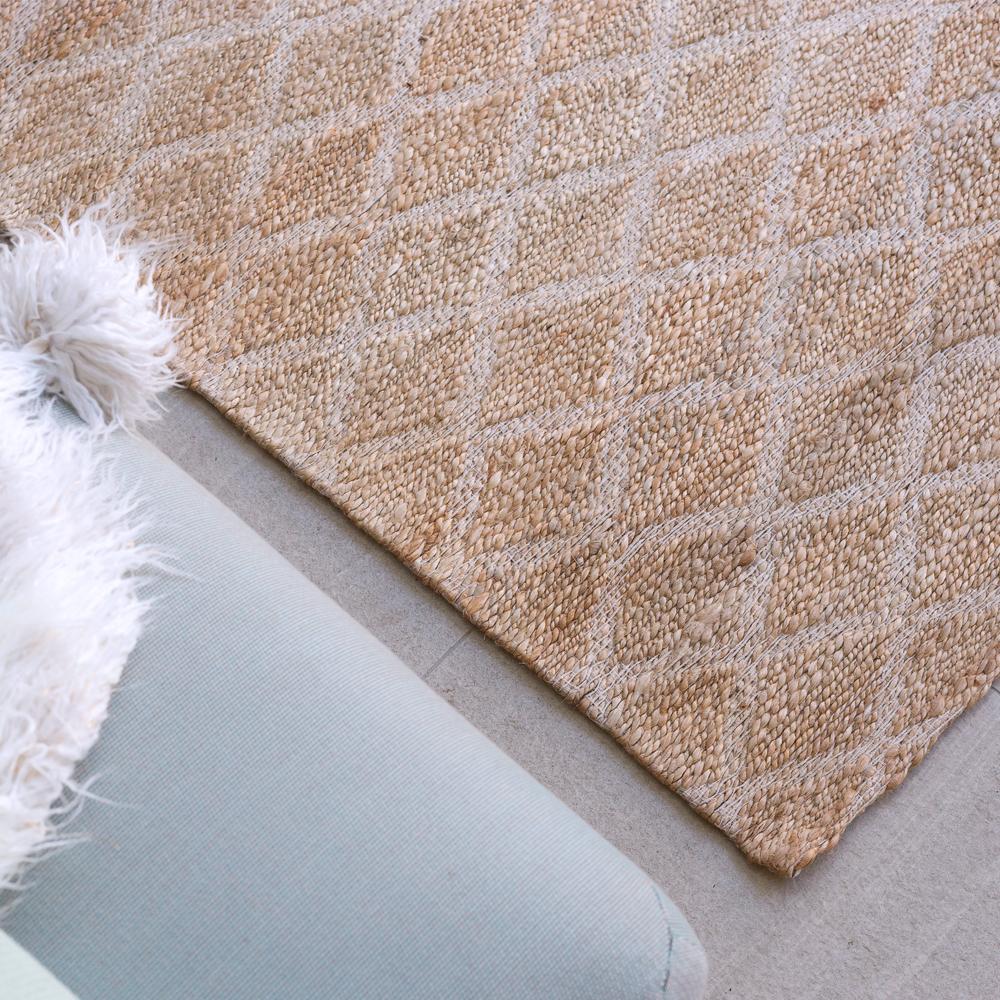 The Ricochet Weave adds a subtle graphic edge to any space. This style masterfully mixes rugged natural jute with a robust cotton, to create an eclectic and energetic pattern through its base. This highly durable, hand-woven style features a cotton