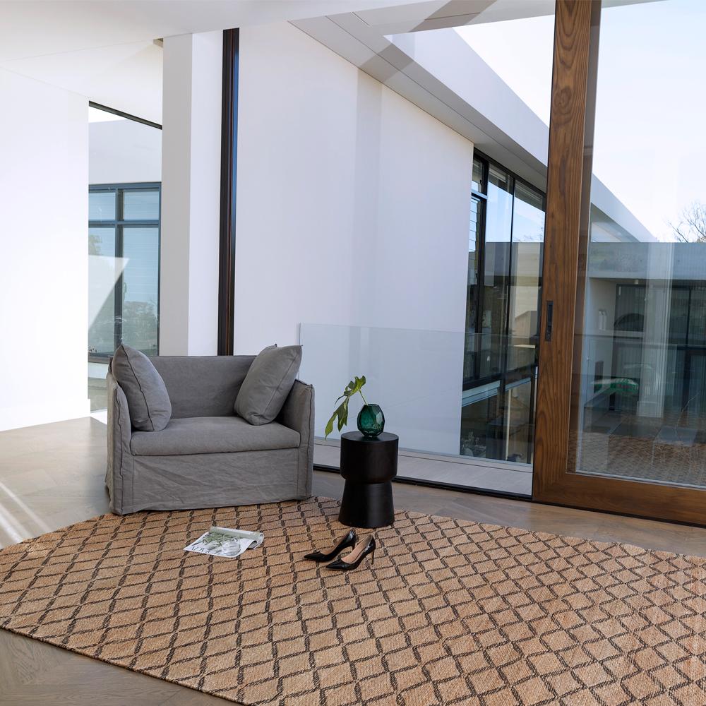 The Ricochet weave adds a subtle graphic edge to any space. This style masterfully mixes rugged natural jute with a robust cotton, to create an eclectic and energetic pattern through its base. This highly durable, handwoven style features a cotton