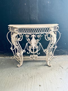 Highly Ornate White Metal and Marble Serpentine Top Console Table