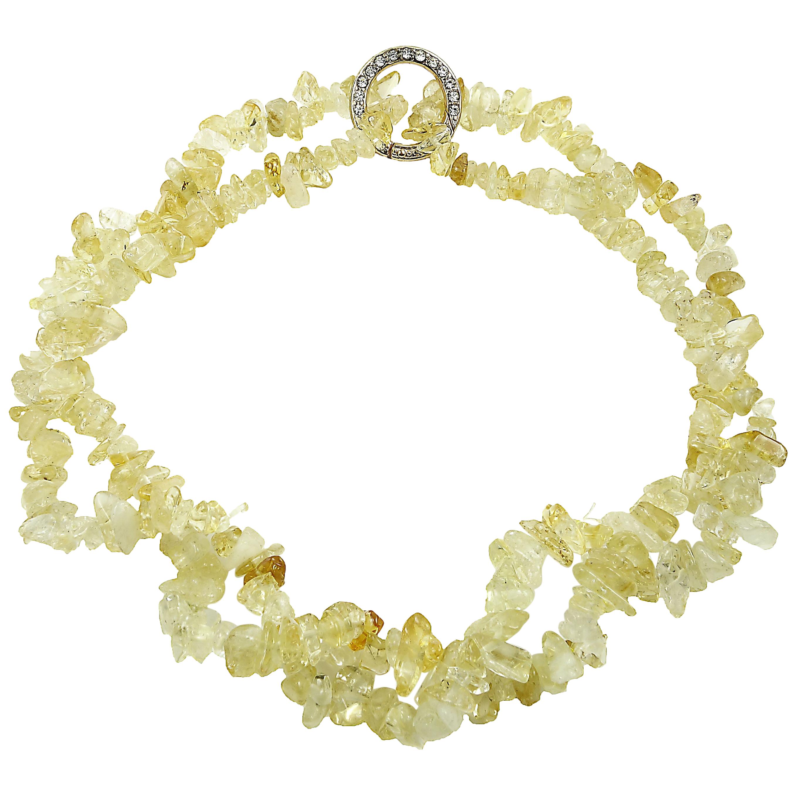 32 Inch Infinity necklace of highly polished Citrine chips  with sparkly clasp.  Wear this gorgeous stand of Citrine long or doubled.  The lovely golden color enhances your entire wardrobe. In ancient times people carried Citrine as a protection