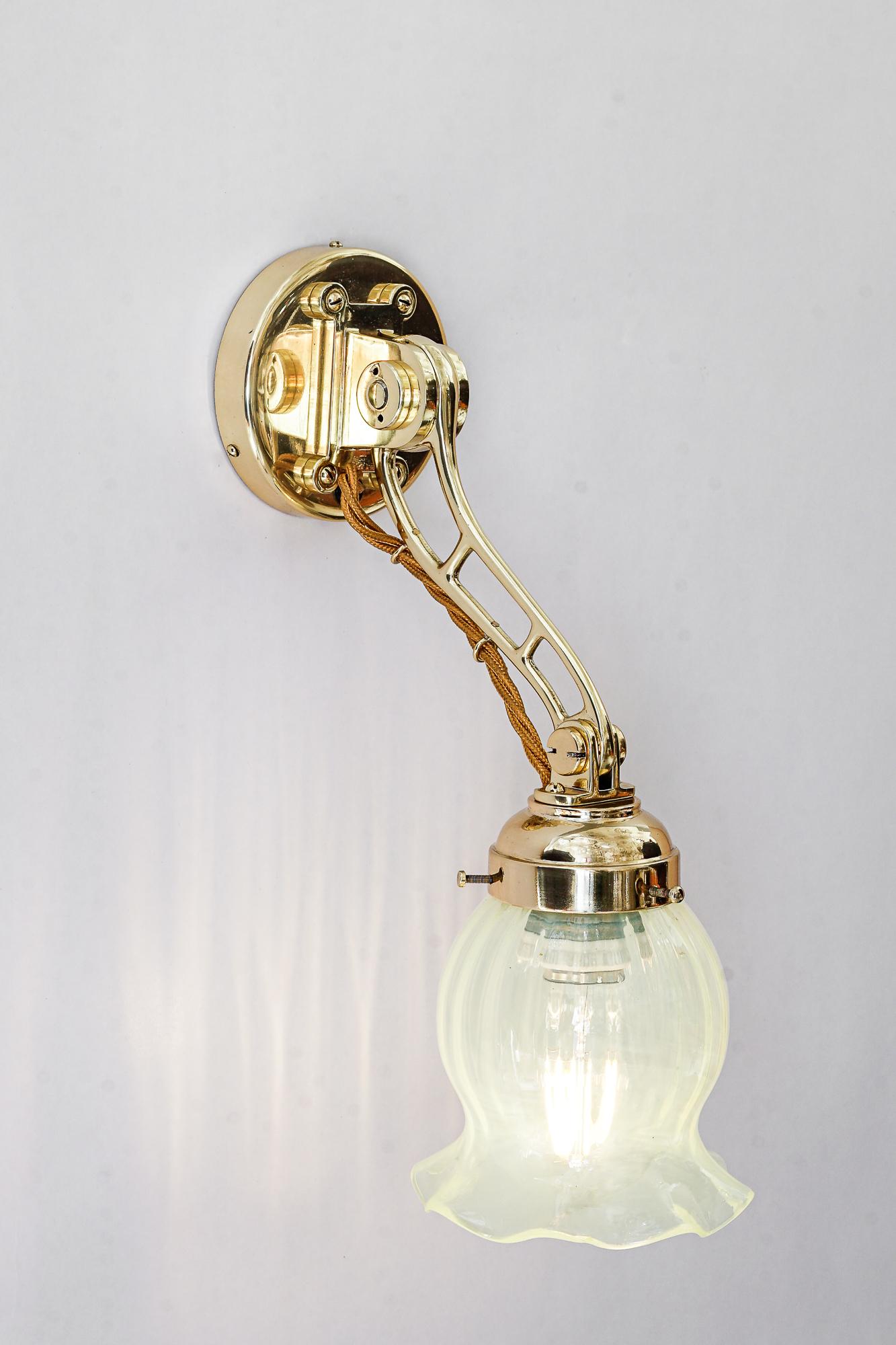 Hight Quality and solid adjustable wall lamp with opaline glass shade 1920s For Sale 4