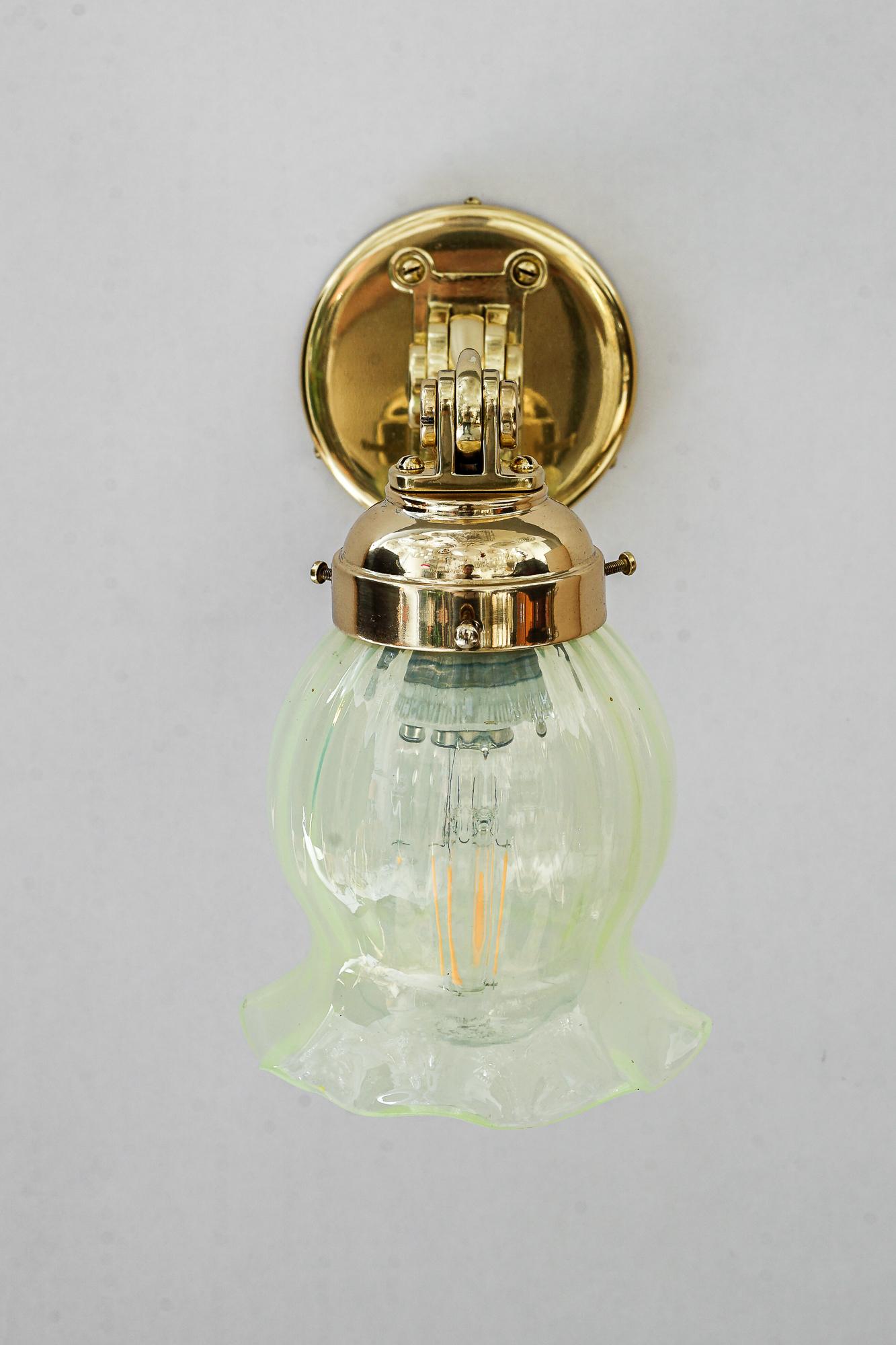 Hight Quality and solid adjustable wall lamp with opaline glass shade vienna around 1920s
Original opaline glass shade
Brass polished and stove enameled
Hight from 20cm - 31cm