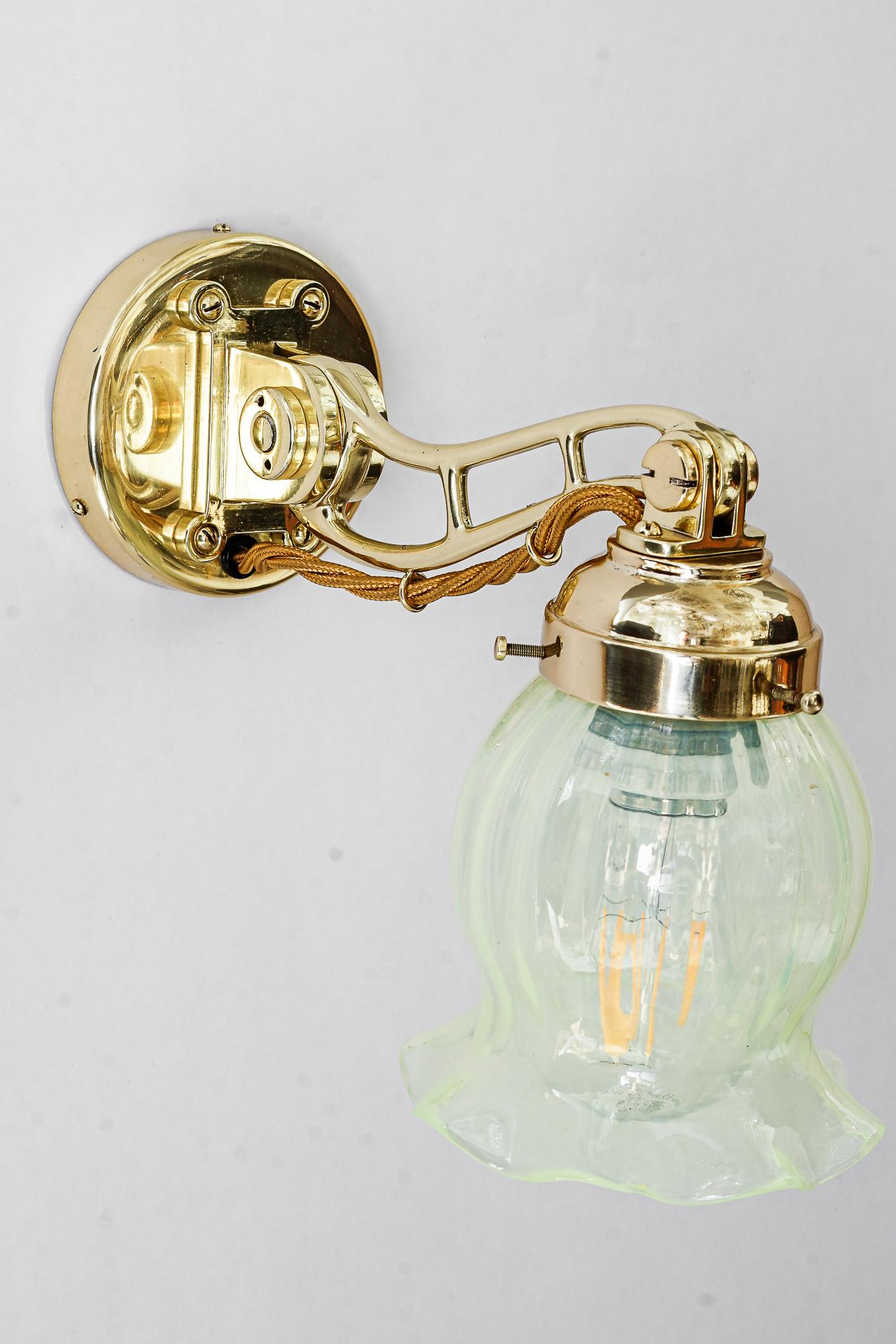 Art Deco Hight Quality and solid adjustable wall lamp with opaline glass shade 1920s For Sale
