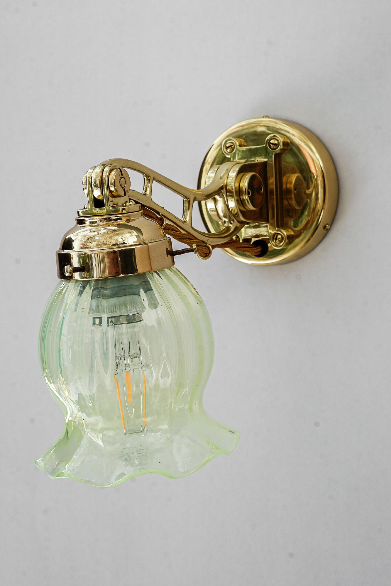 Lacquered Hight Quality and solid adjustable wall lamp with opaline glass shade 1920s For Sale