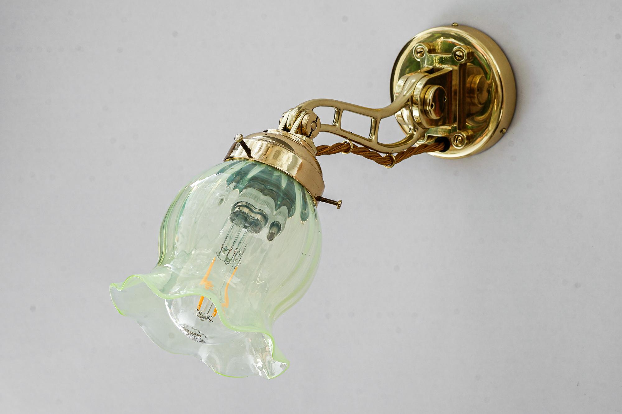 Hight Quality and solid adjustable wall lamp with opaline glass shade 1920s In Good Condition For Sale In Wien, AT