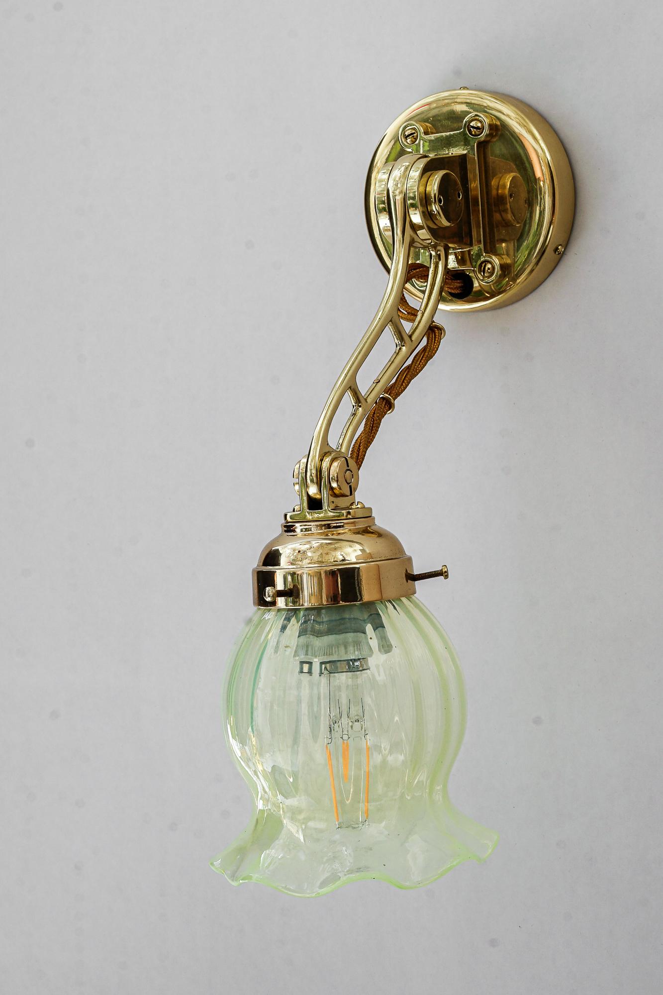 Early 20th Century Hight Quality and solid adjustable wall lamp with opaline glass shade 1920s For Sale