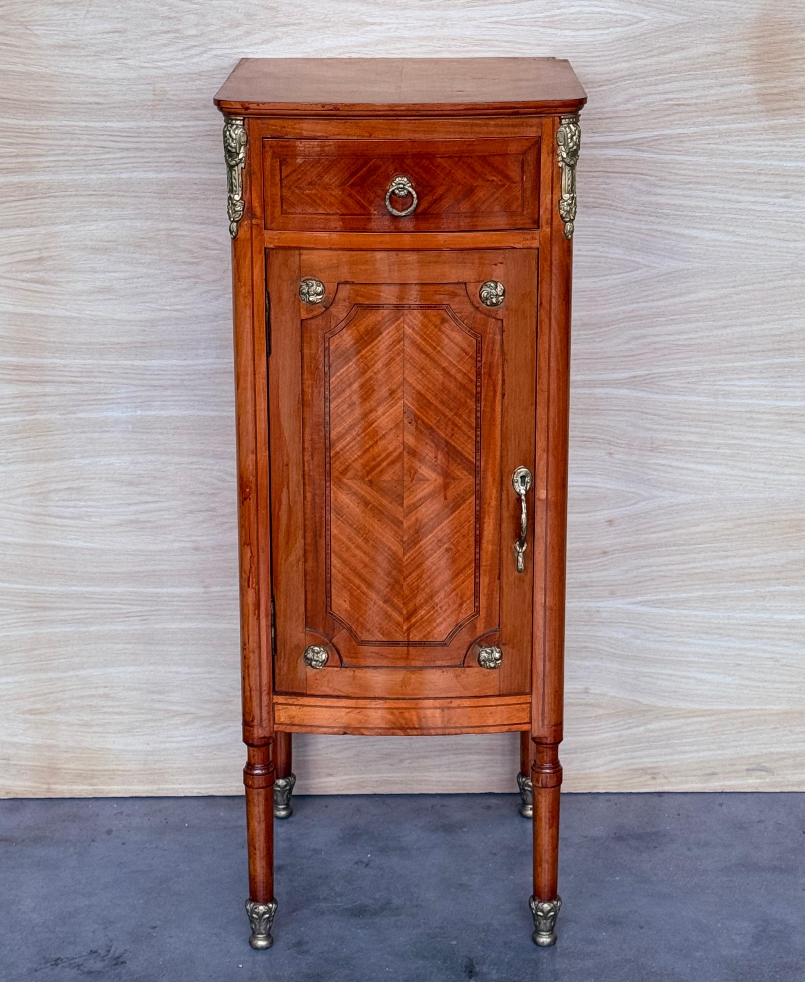 A charming and elegant pair of period Louis XVI (1774-1792) French chiffoniers. circa 1930  Exquisitely hand-crafted in France in the late 19th century, most likely Parisian work, high-quality solid wood construction finished in exotic kingwood,