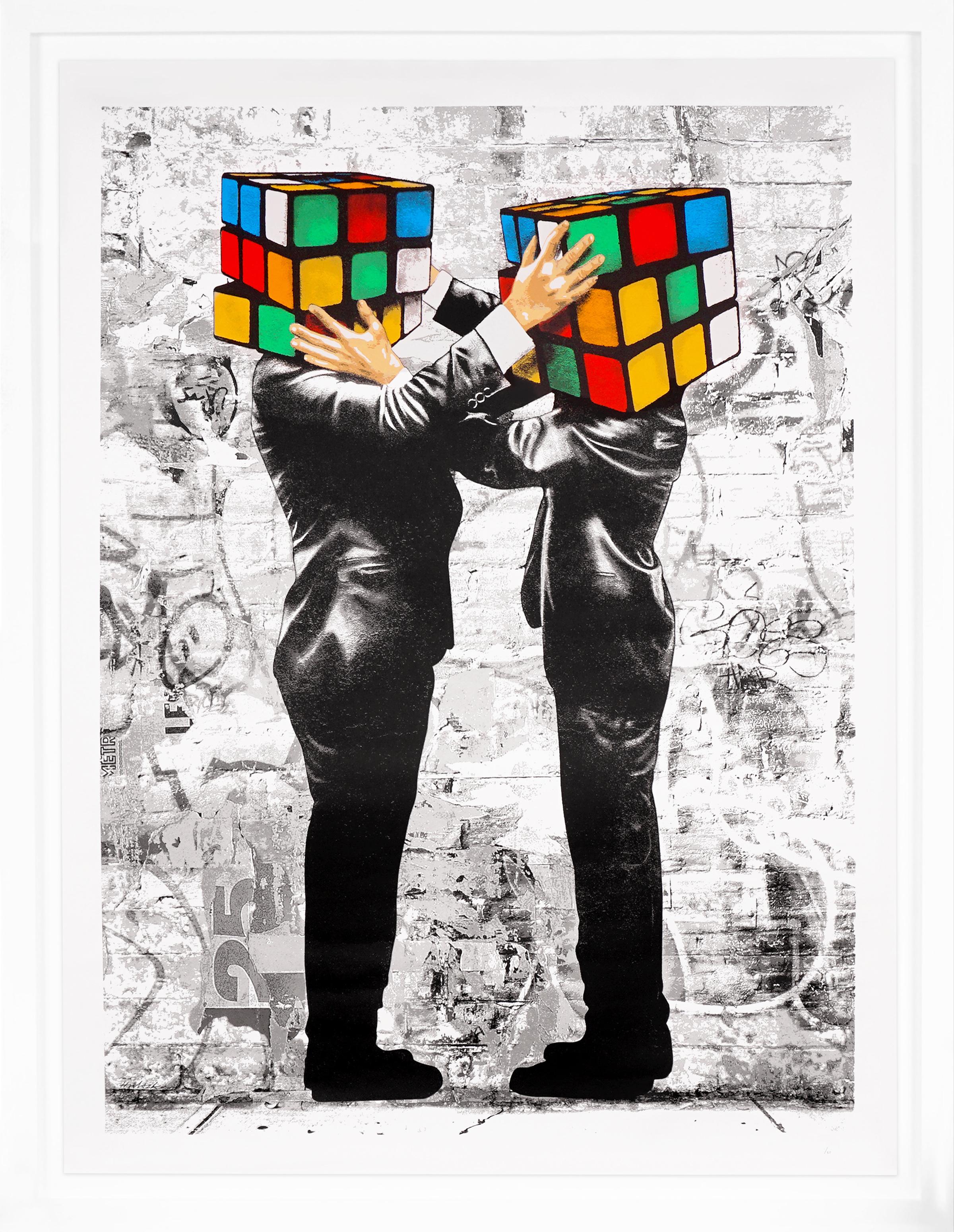 'Puzzled,' by contemporary prodigy Hijack, reflects the seemingly insurmountable political and cultural divide in today’s society. Hijack has commented that this iconic print is also a message that can apply to most human relationships in life.
