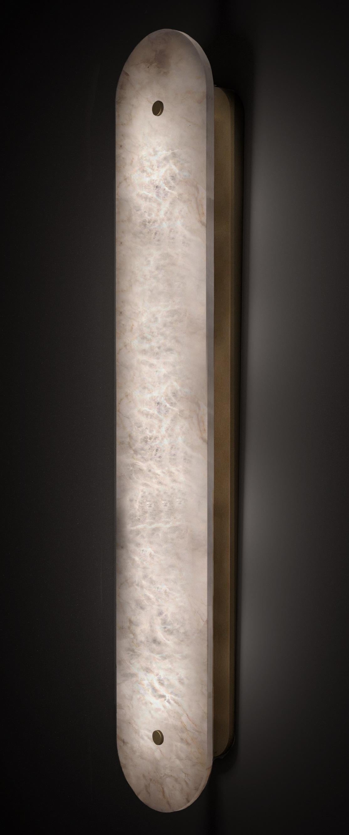 Hikari Large Brushed Brass Applique by Alabastro Italiano
Dimensions: Ø 15 x H 80 cm.
Materials: White alabaster and brushed brass.

Available in different finishes: Shiny Silver, Bronze, Brushed Brass, Ruggine of Florence, Brushed Burnished, Shiny