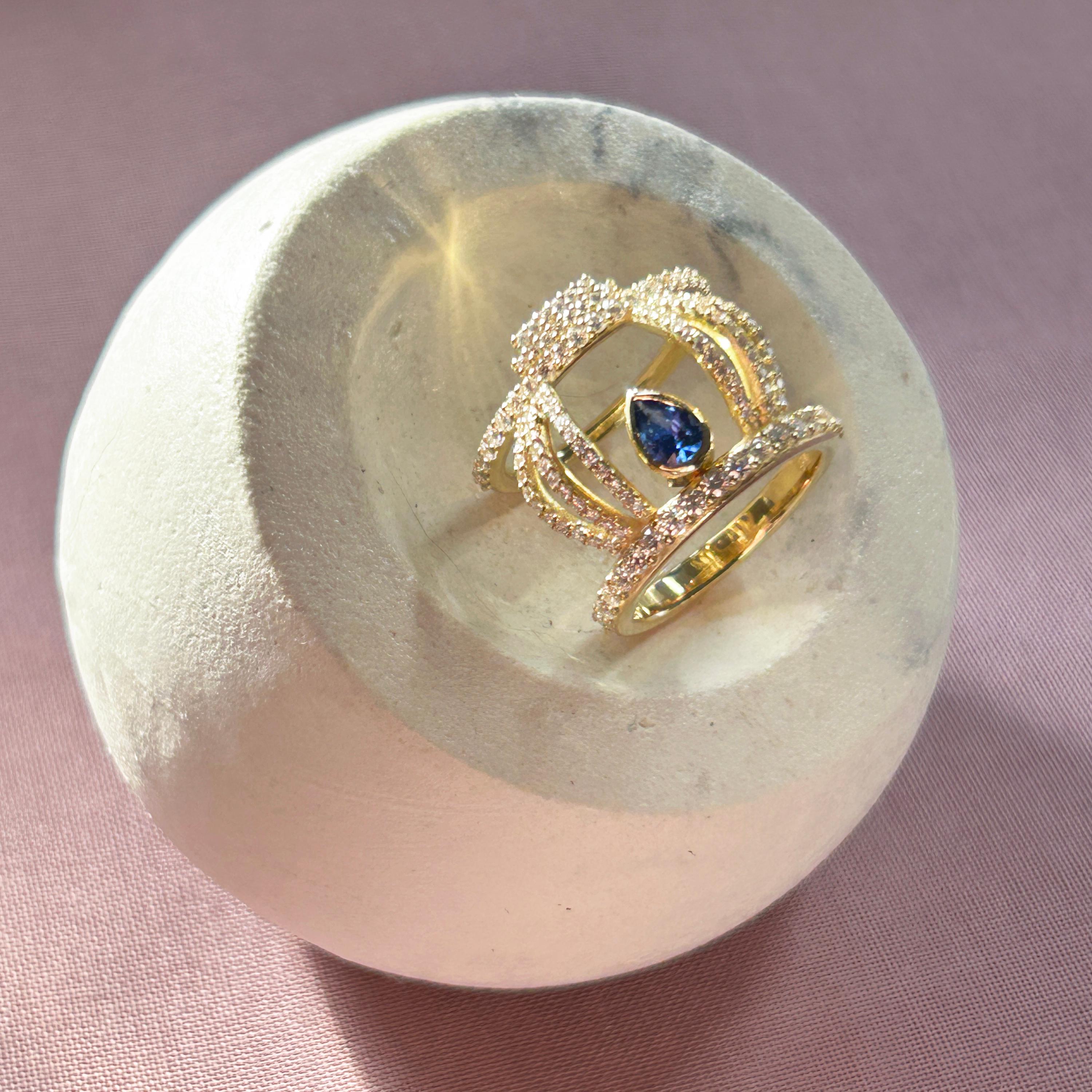Pear Cut Hikari Ring in 18 Karat Yellow Gold with Diamonds And A Sapphire For Sale